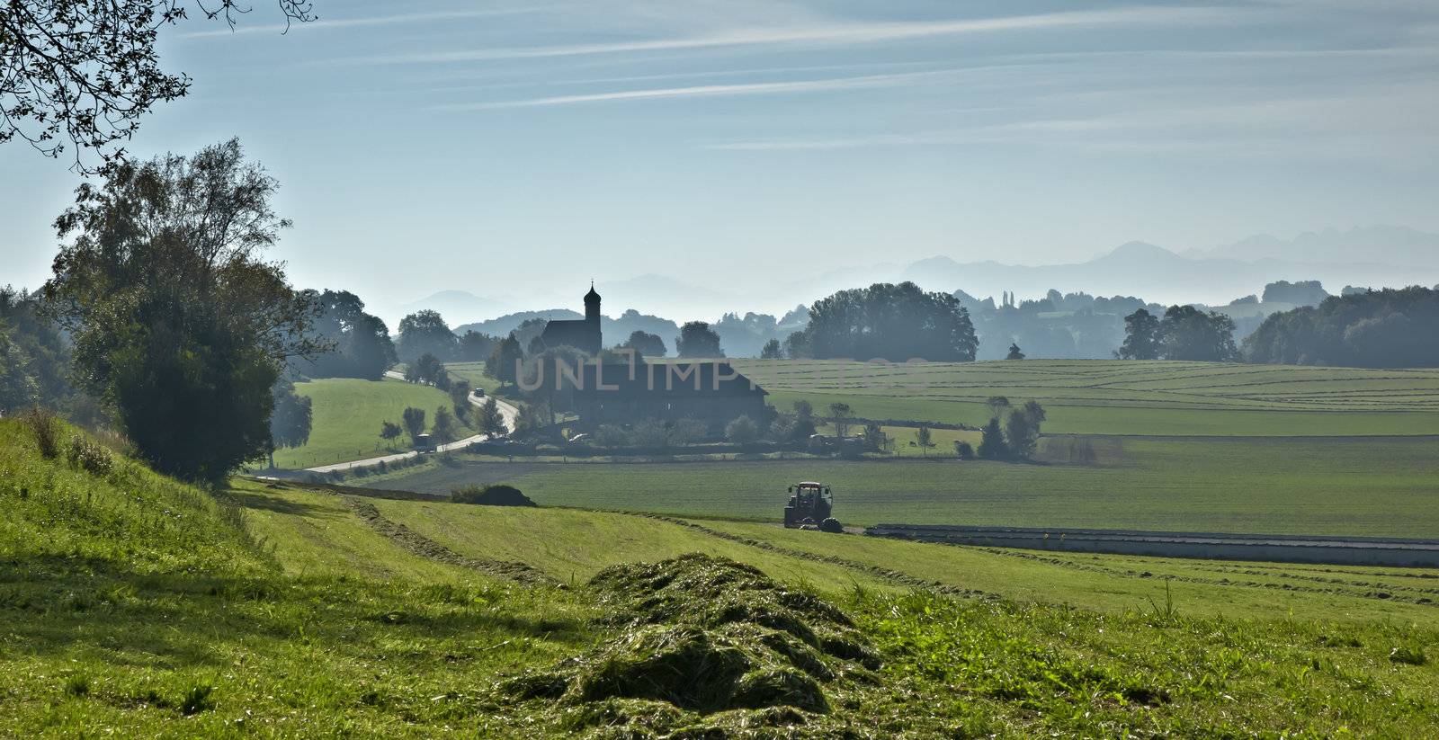 An image of a beautiful landscape with fog in bavaria germany