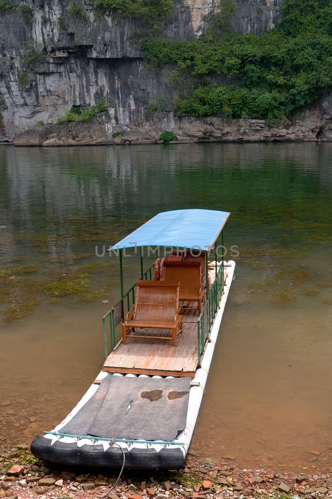 Bamboo raft in Li River by rigamondis