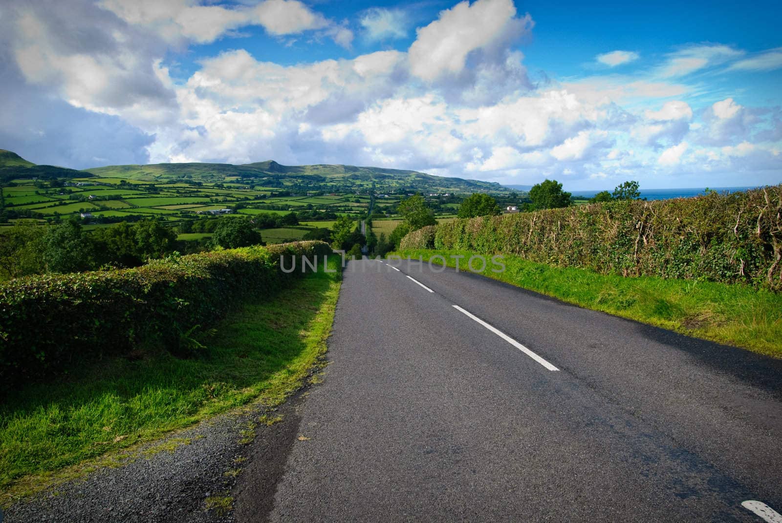 long, long road through beautiful landscape of northern Ireland