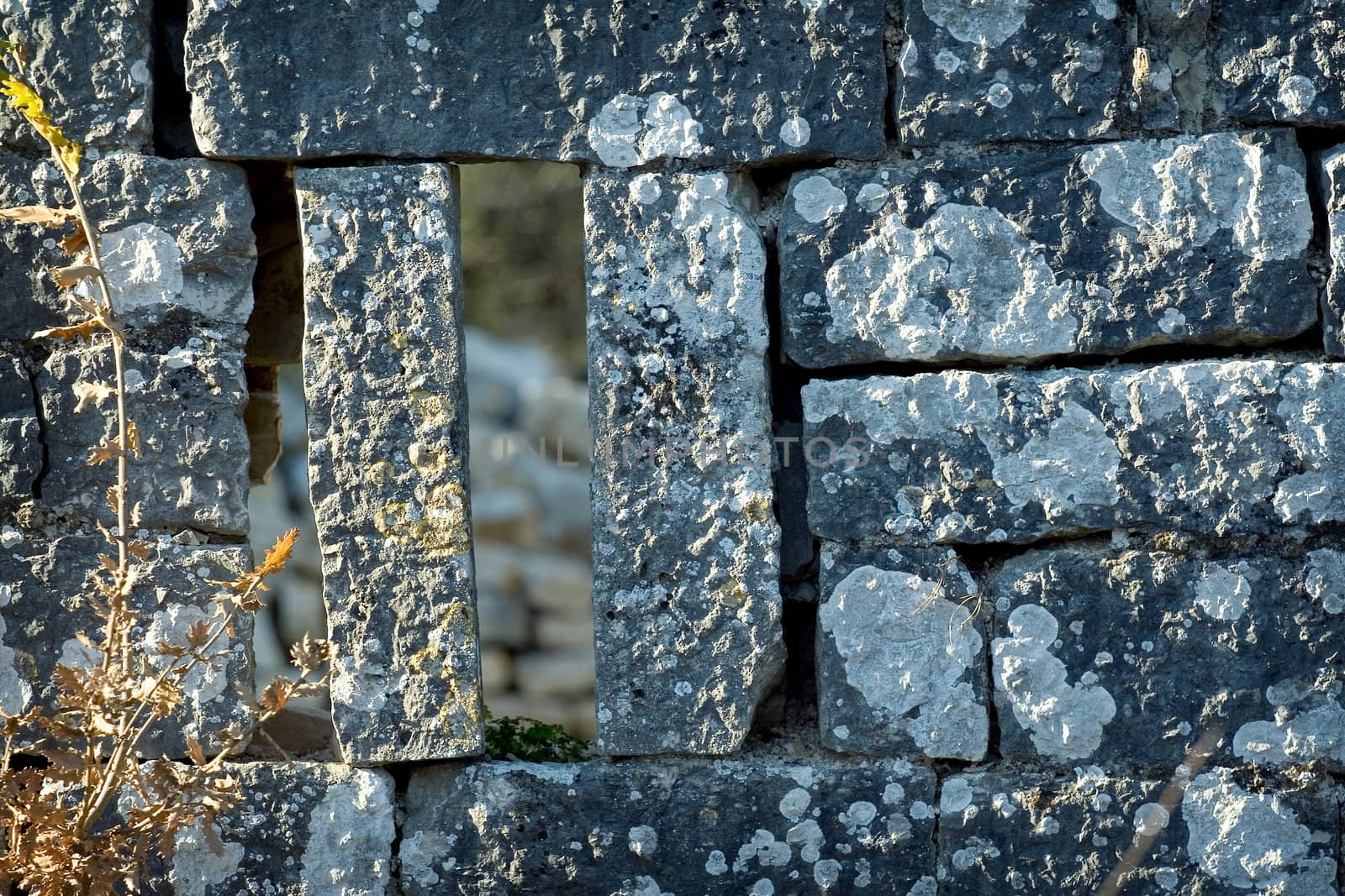 Old grunge stone wall on a ancient fort