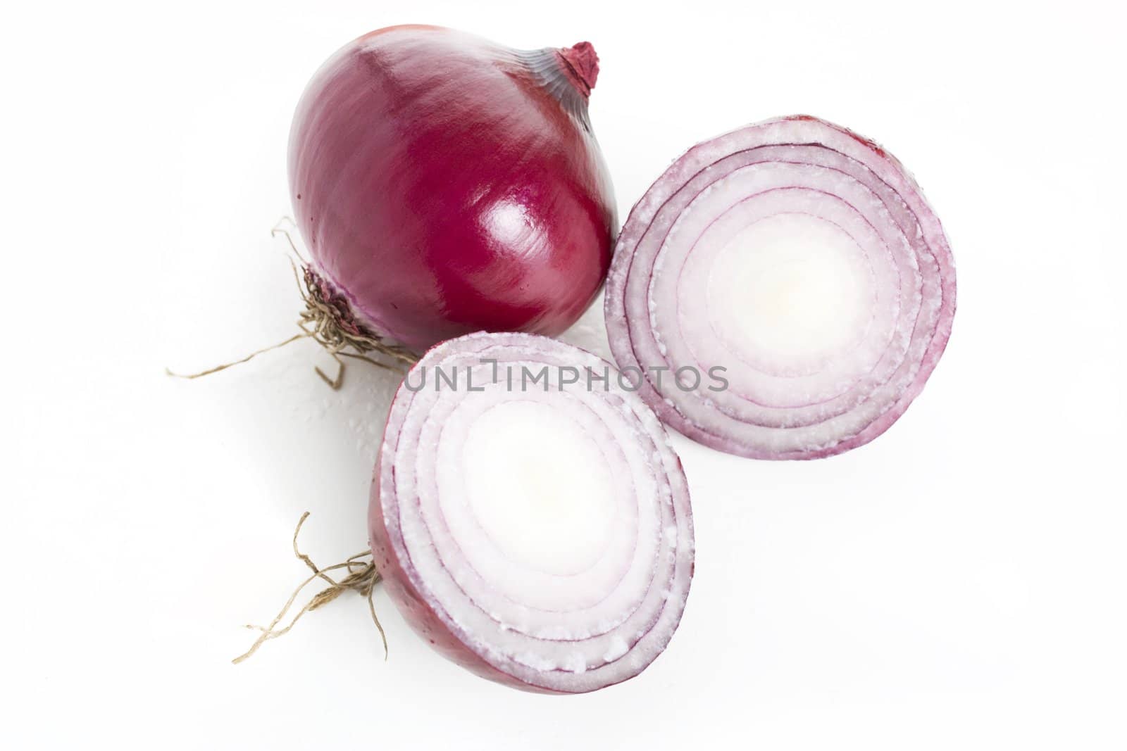 Whole red onion and cut red onion.