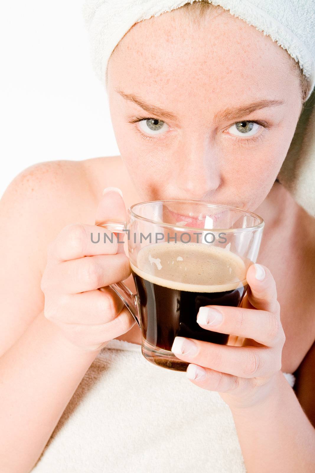 Studio portrait of a spa girl smelling her morning coffee