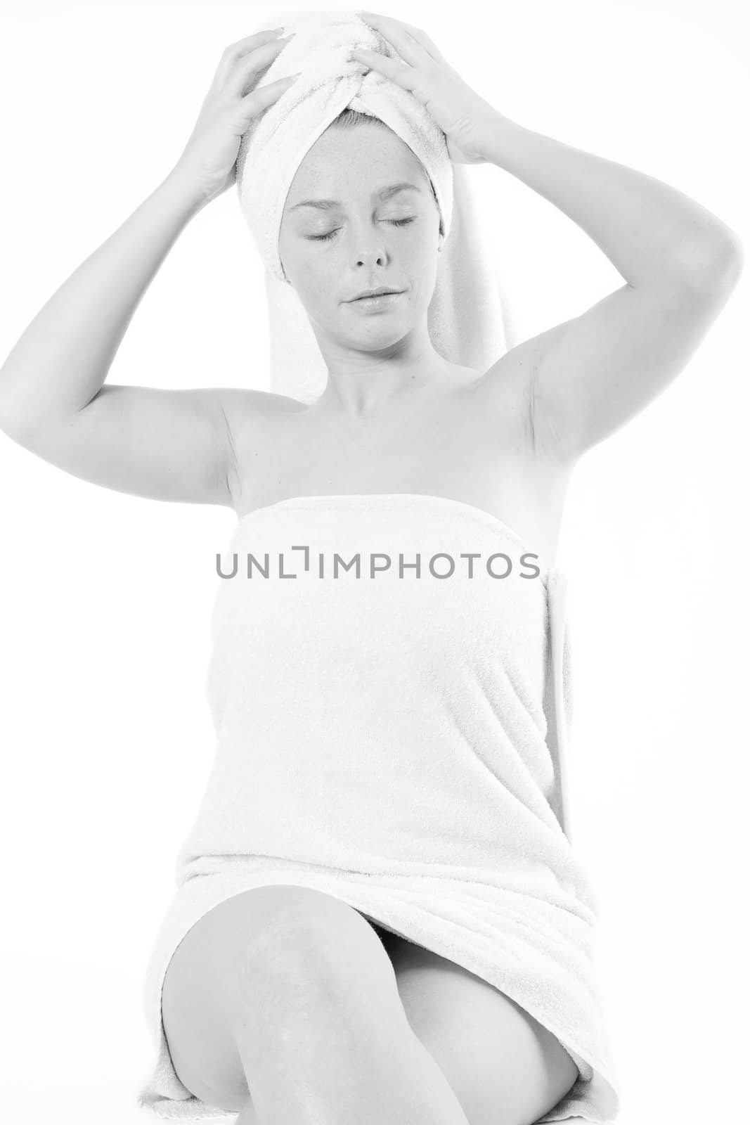 Studio portrait of a spa girl feeling in black and white