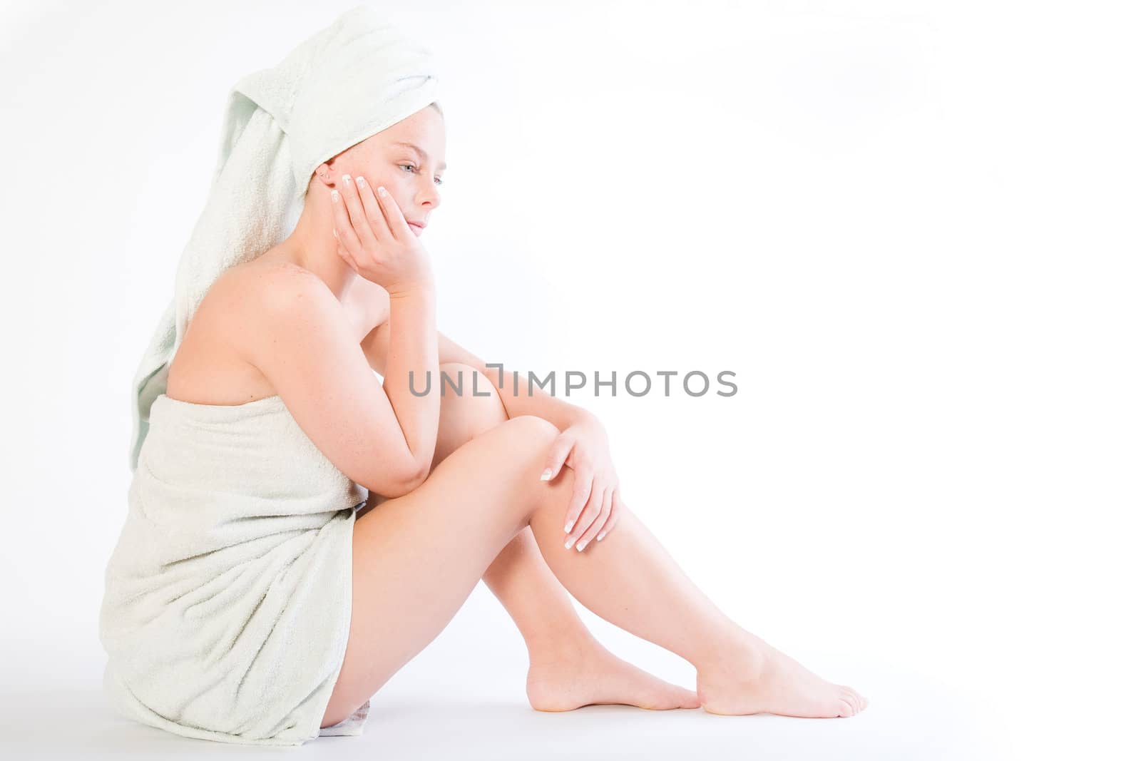 Studio portrait of a spa girl sitting