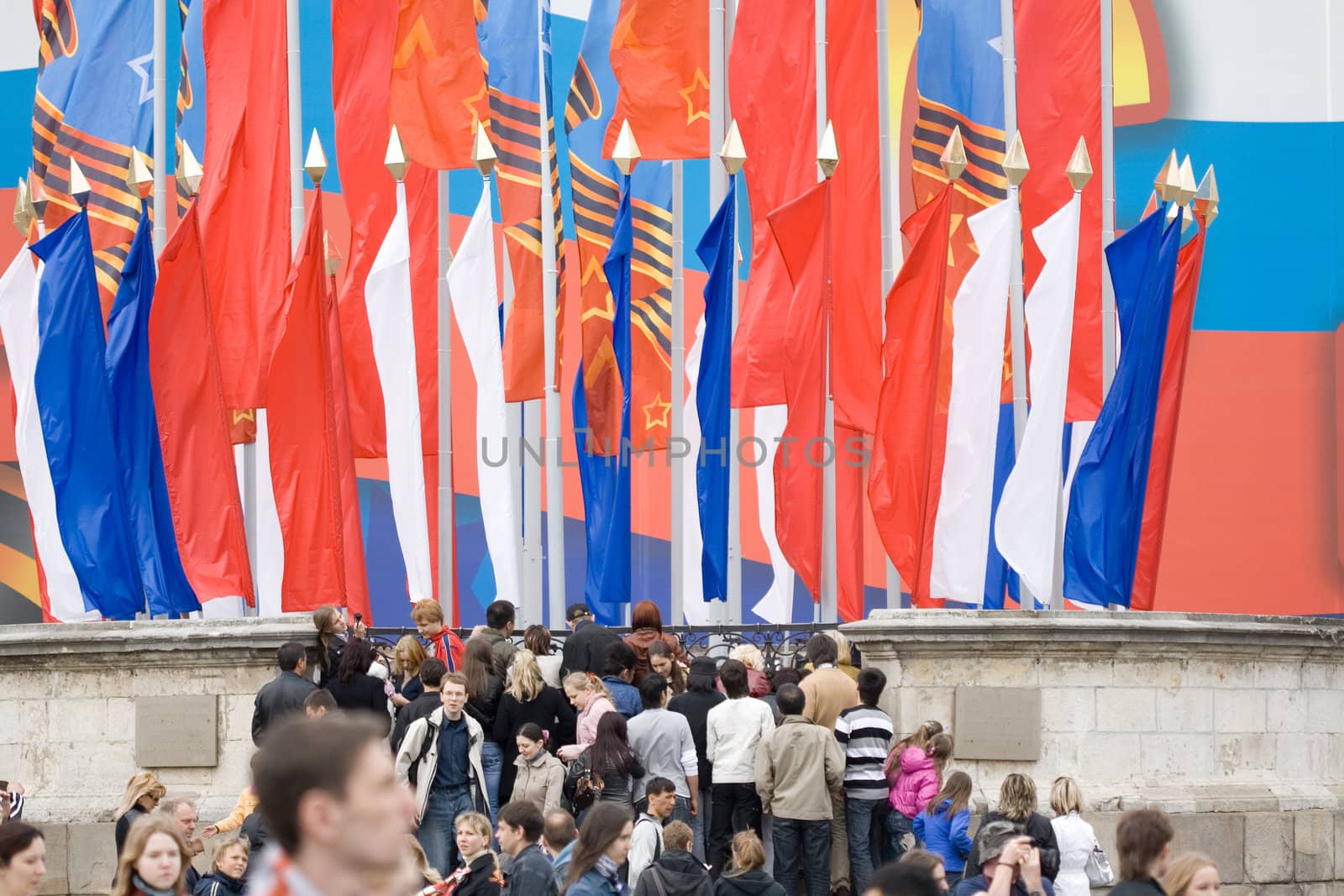 people gathering at the flags by Sethislav