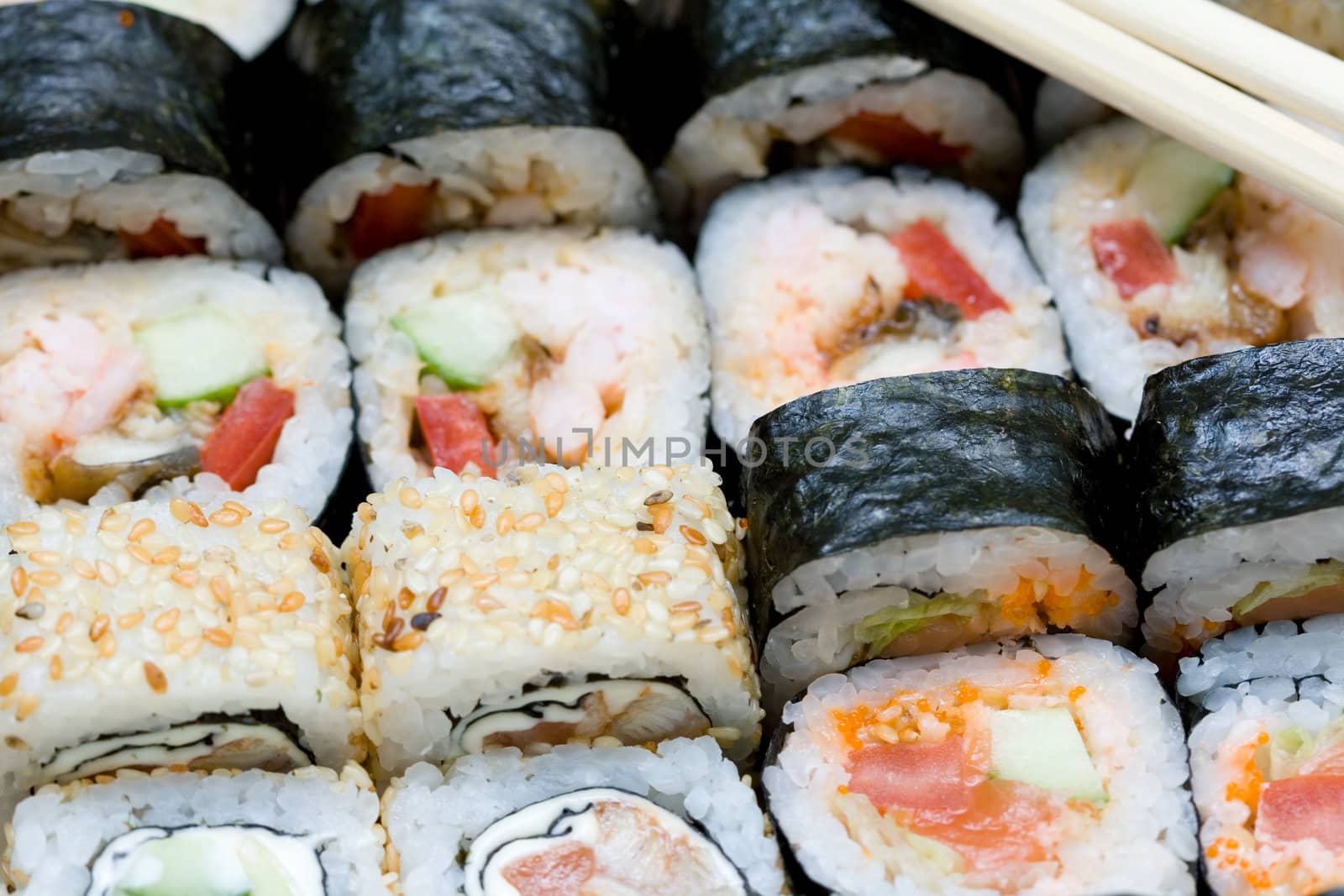 different types of traditional japanese rolls and stiicks close-up 