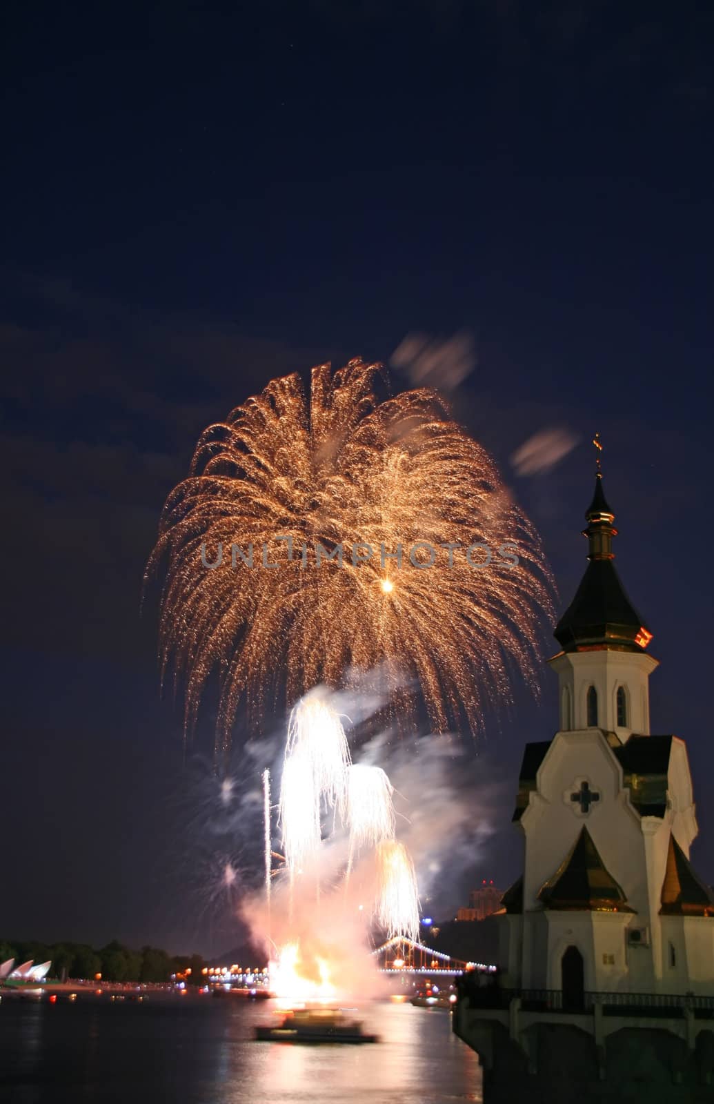 firework and church on river by pilat