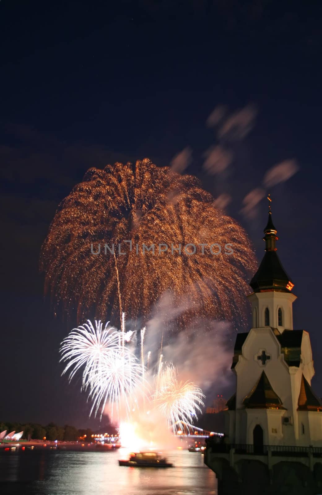 firework and church on river by pilat