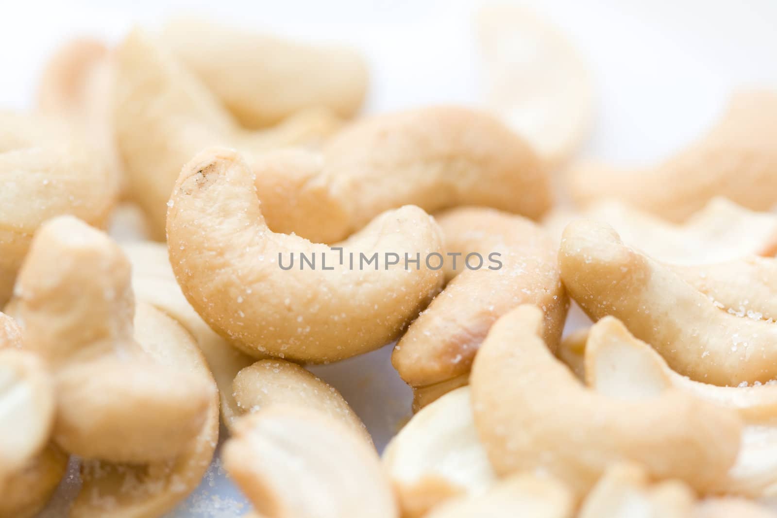 heap of salted cashew close-up