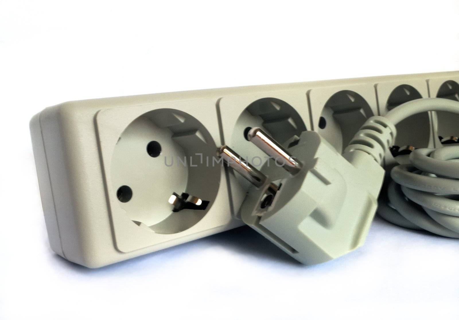Electric plug and outlet in gray tone on white