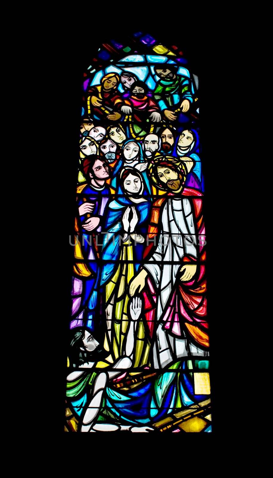 A religious stained glass window inside a church
