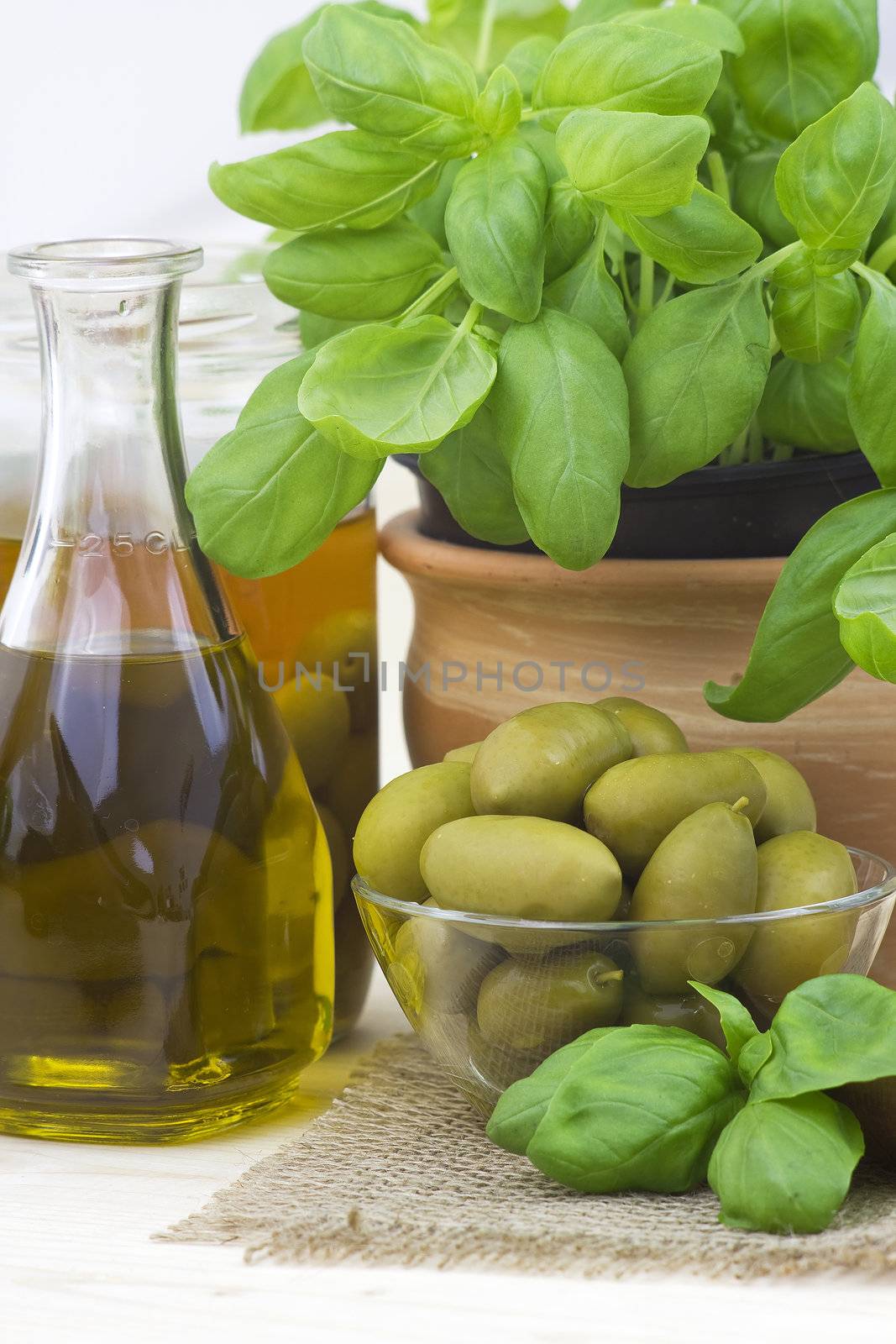 Olives, olive oil and basil