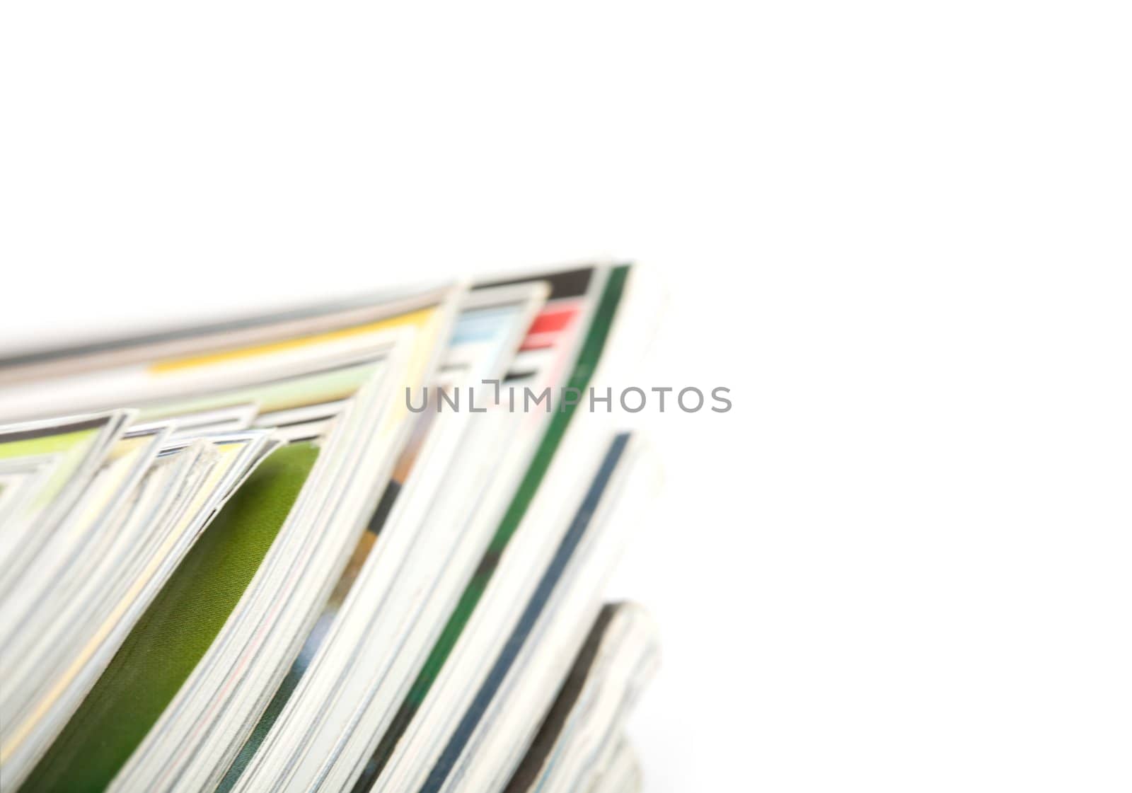 Stack of magazines studio isolated on white background with space for your text