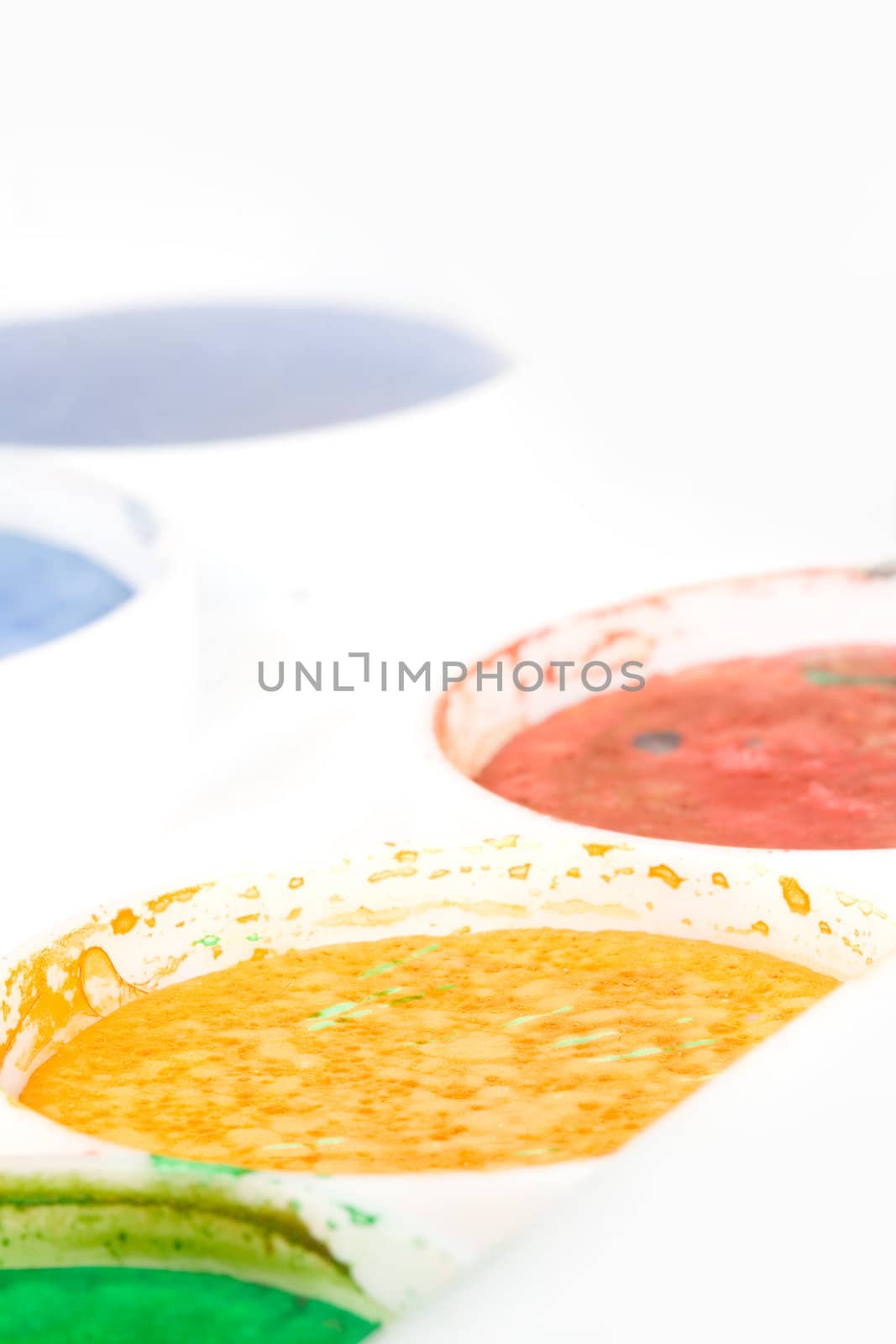 Watercolors  on a white background. High-key photo with shallow DOF