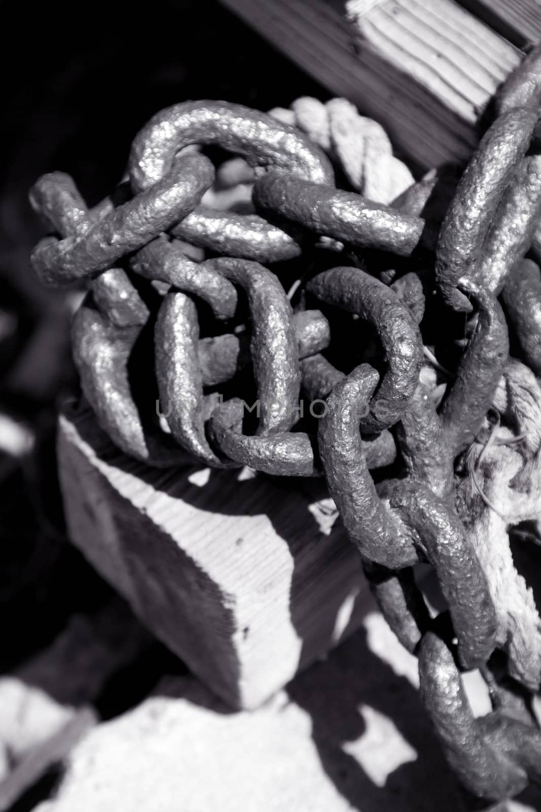 Old rusty metal chain close up , shallow DOF photo