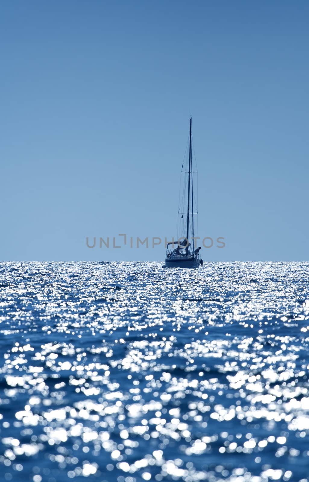 A small boat sailing on a sunny morning