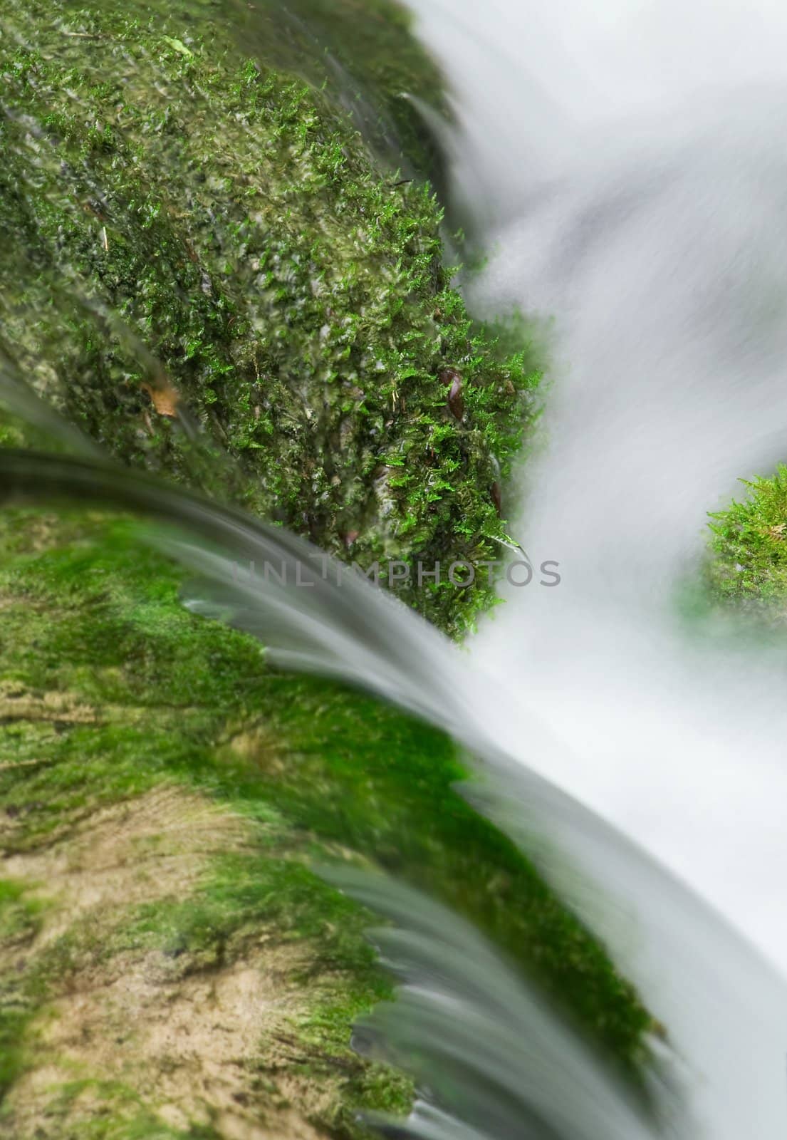 Beautiful small waterfall in springtime