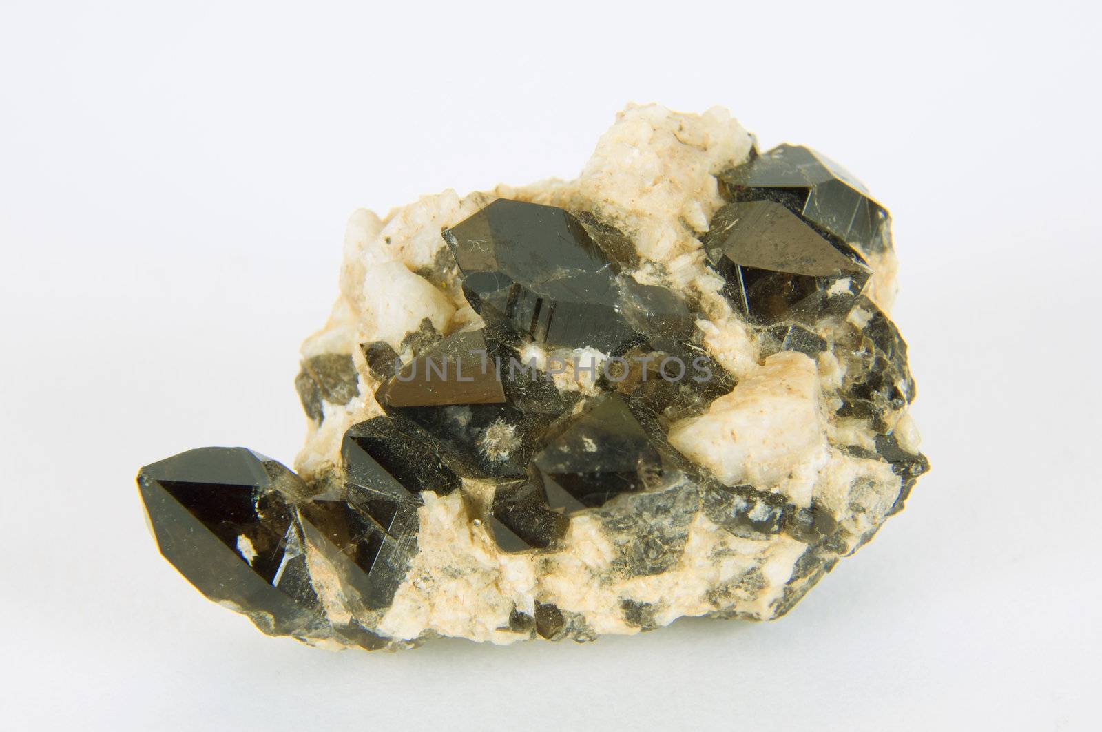 Quartz crystals are black on a white background