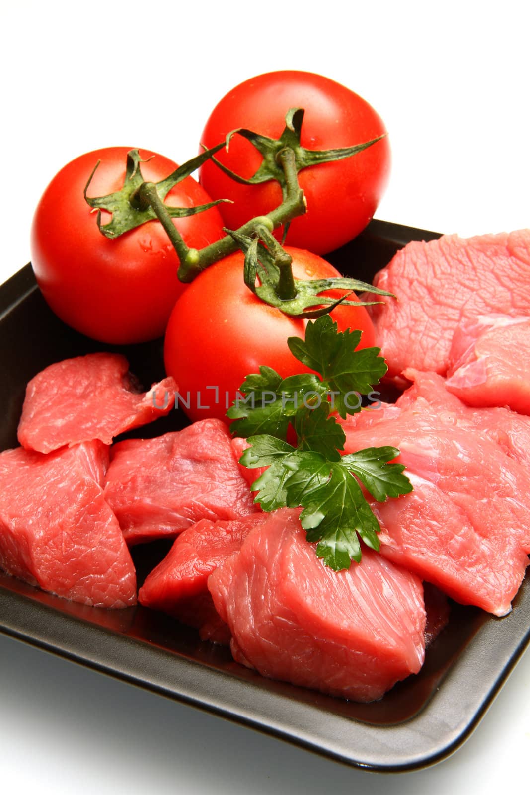 Raw fresh meat sliced in cubes 