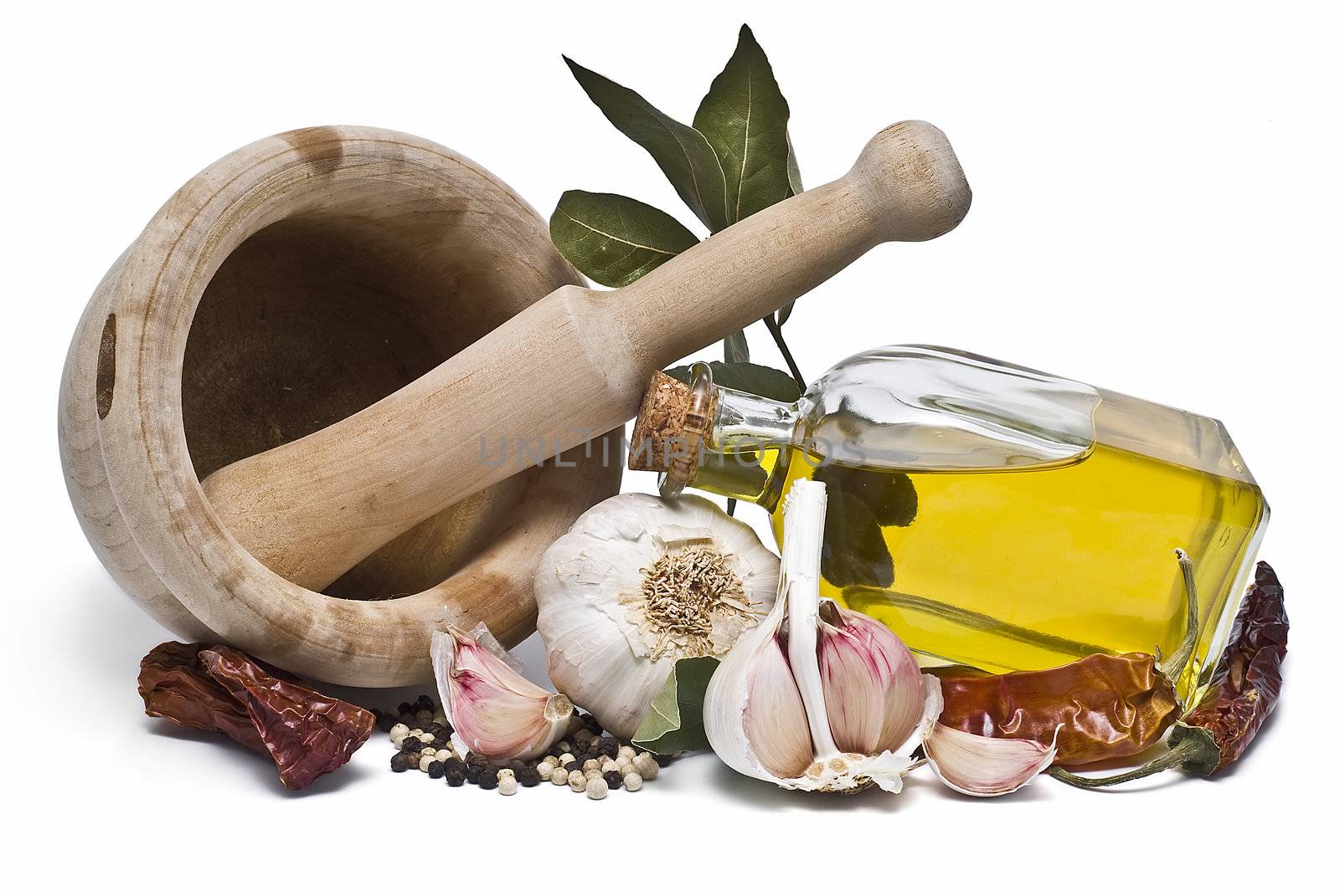Mediterranean spices and olive oil isolated on a white background.