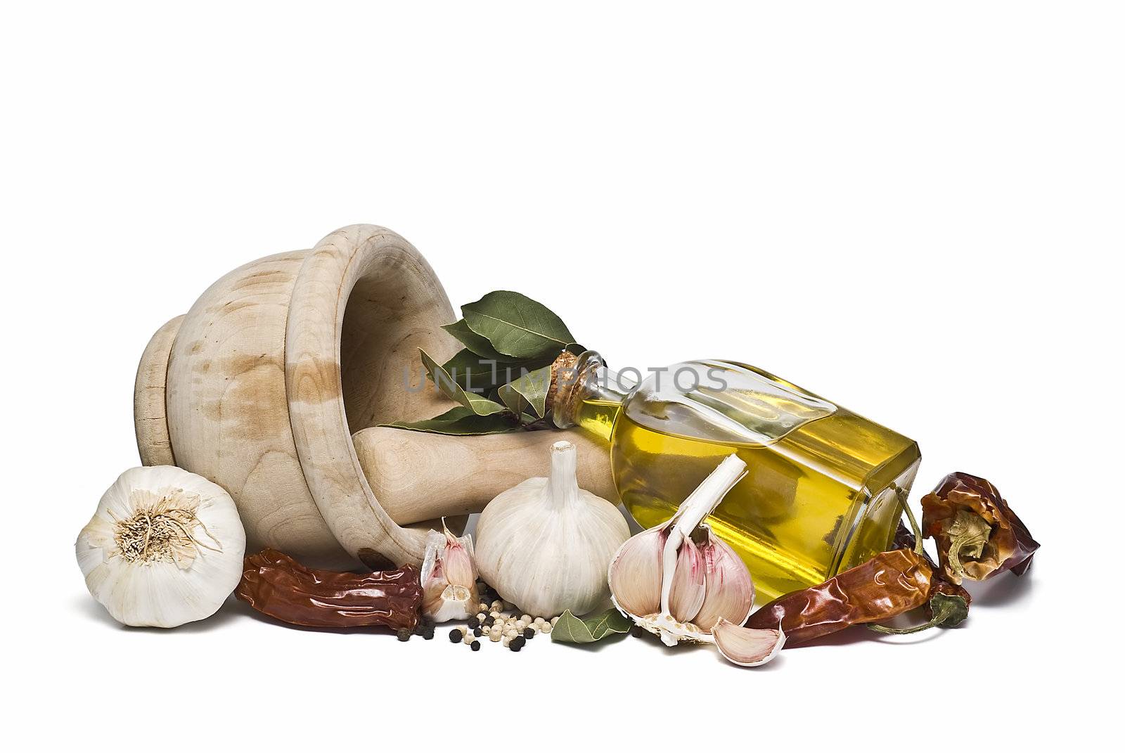 Mediterranean spices and olive oil isolated on a white background.