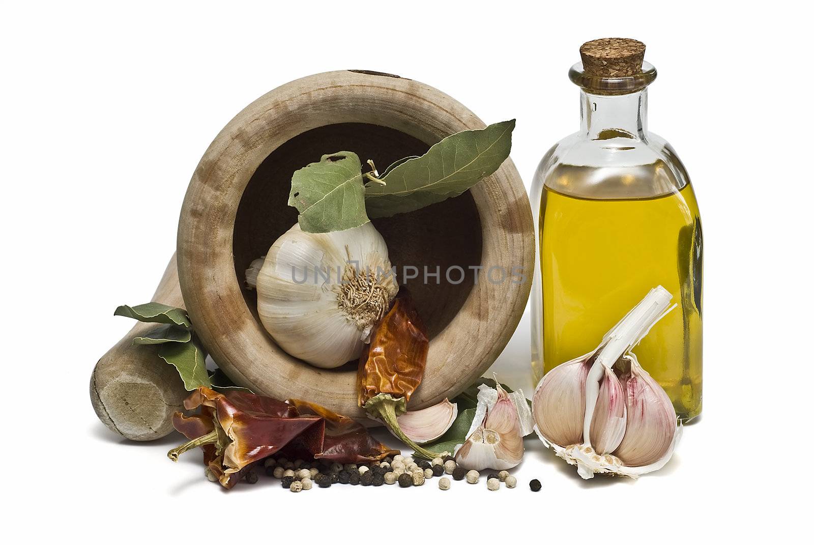 Mediterranean spices and olive oil isolated on a white background.