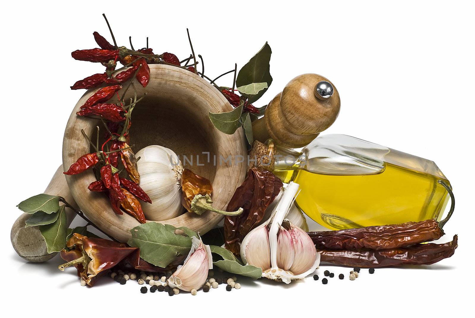 Mediterranean spices and olive oil isolated on a white background.