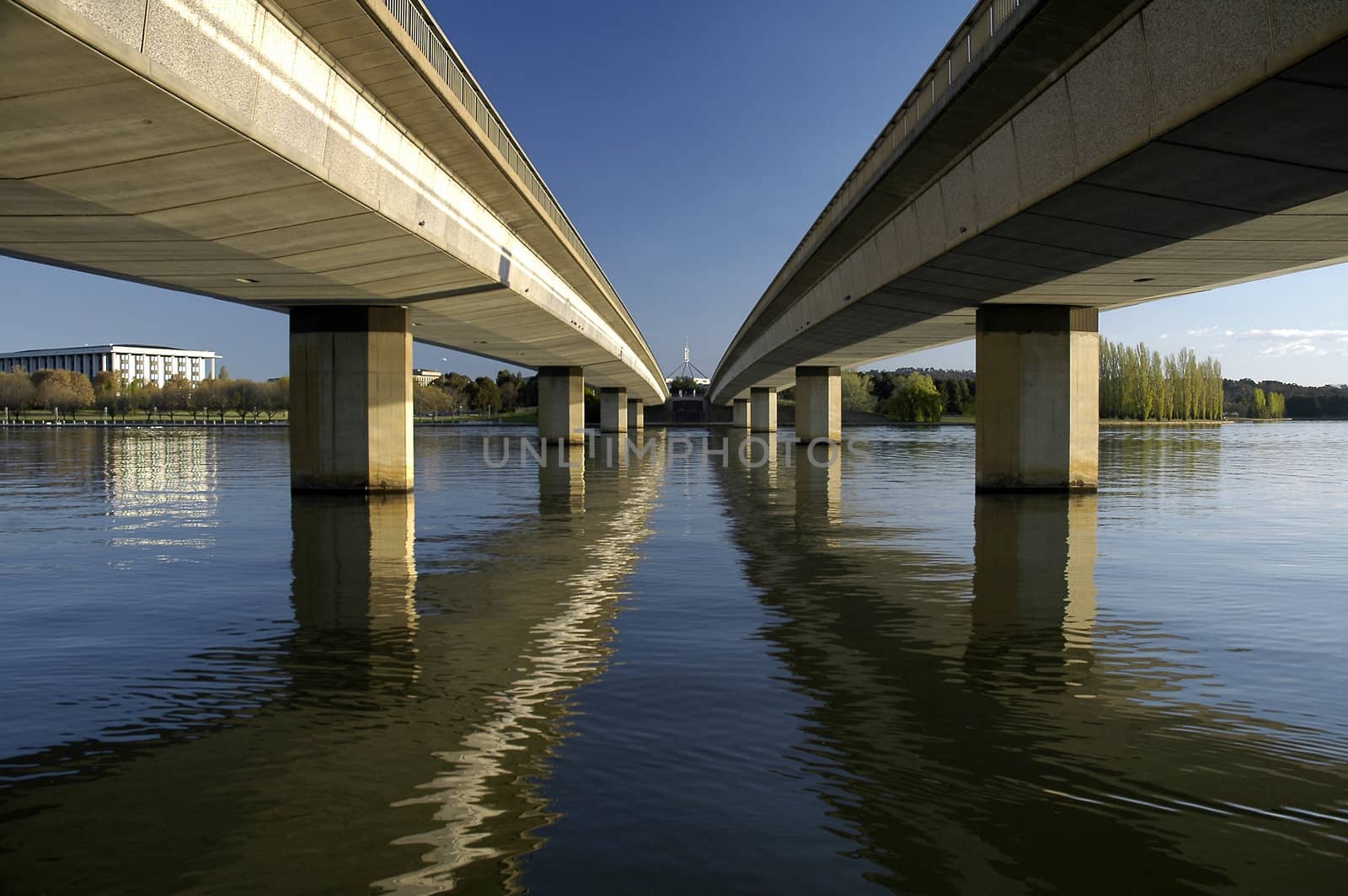 Commonwealth Avenue Bridge leading to Canberra Parliament House, reflection in Lake Burley Griffin