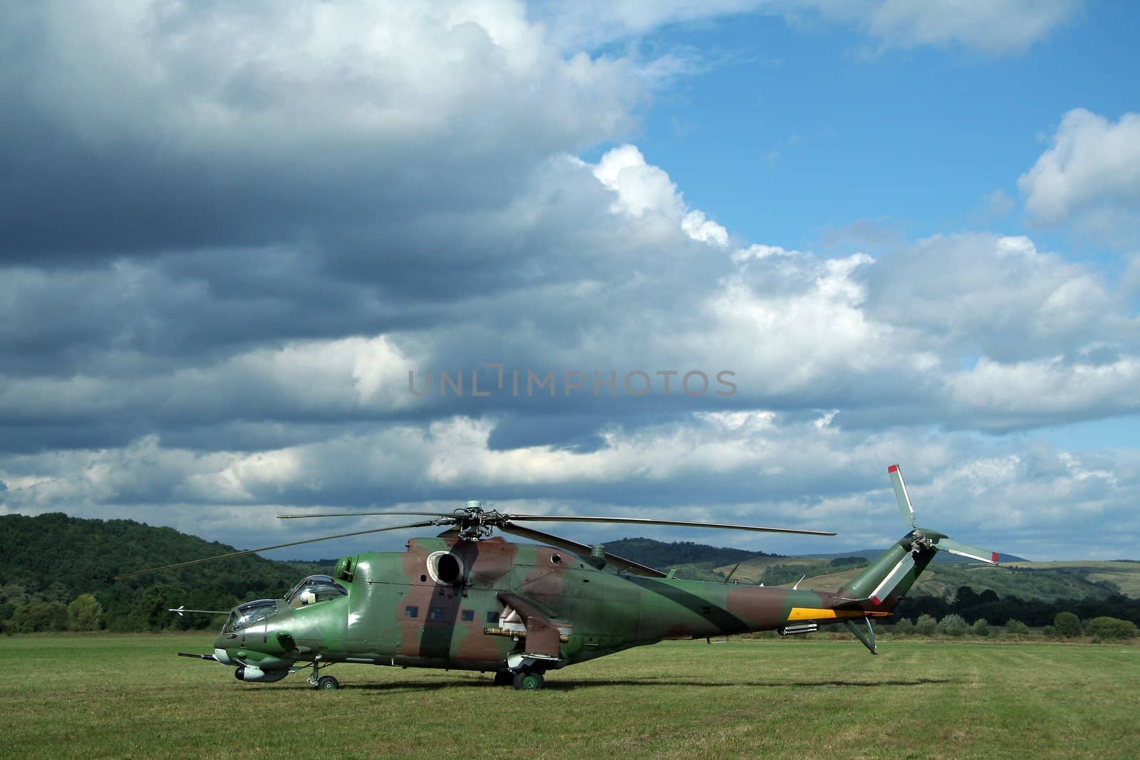 russian army helicopter, cloudy sky in background