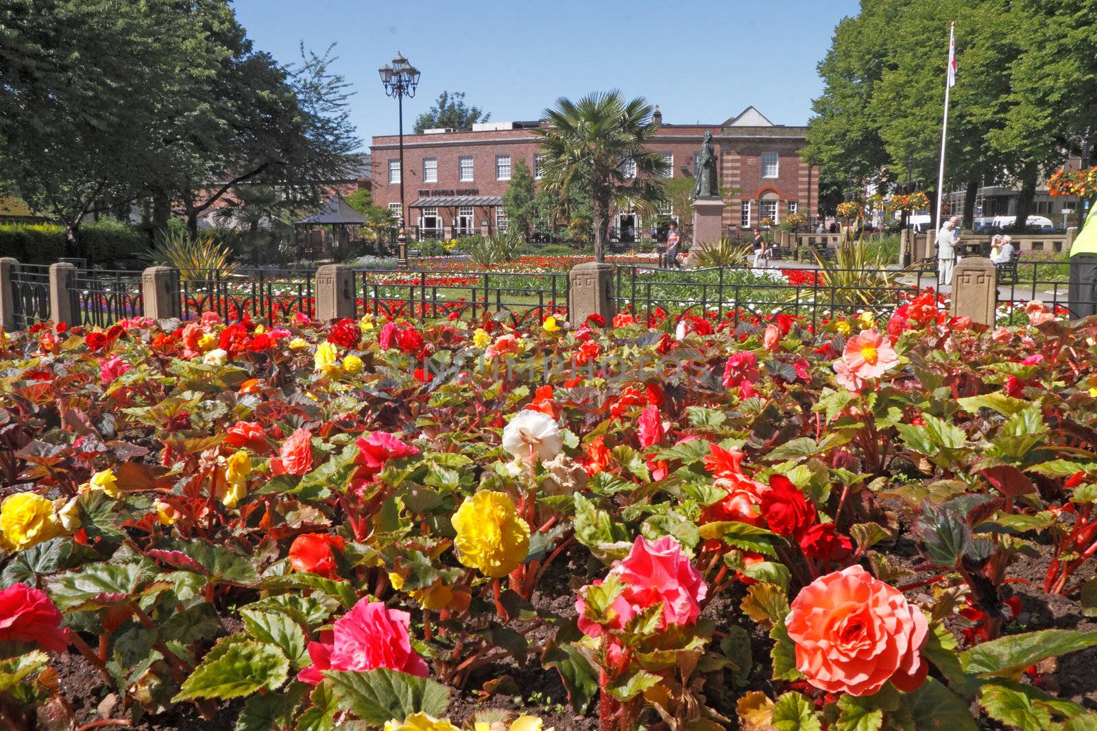 There is often a splendid floral display in the Queen's gardens at Newcastle under Lyme in Staffordshire, England.