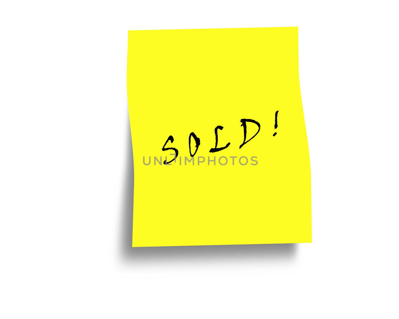 Sold notice on a yellow post it note with copy space.