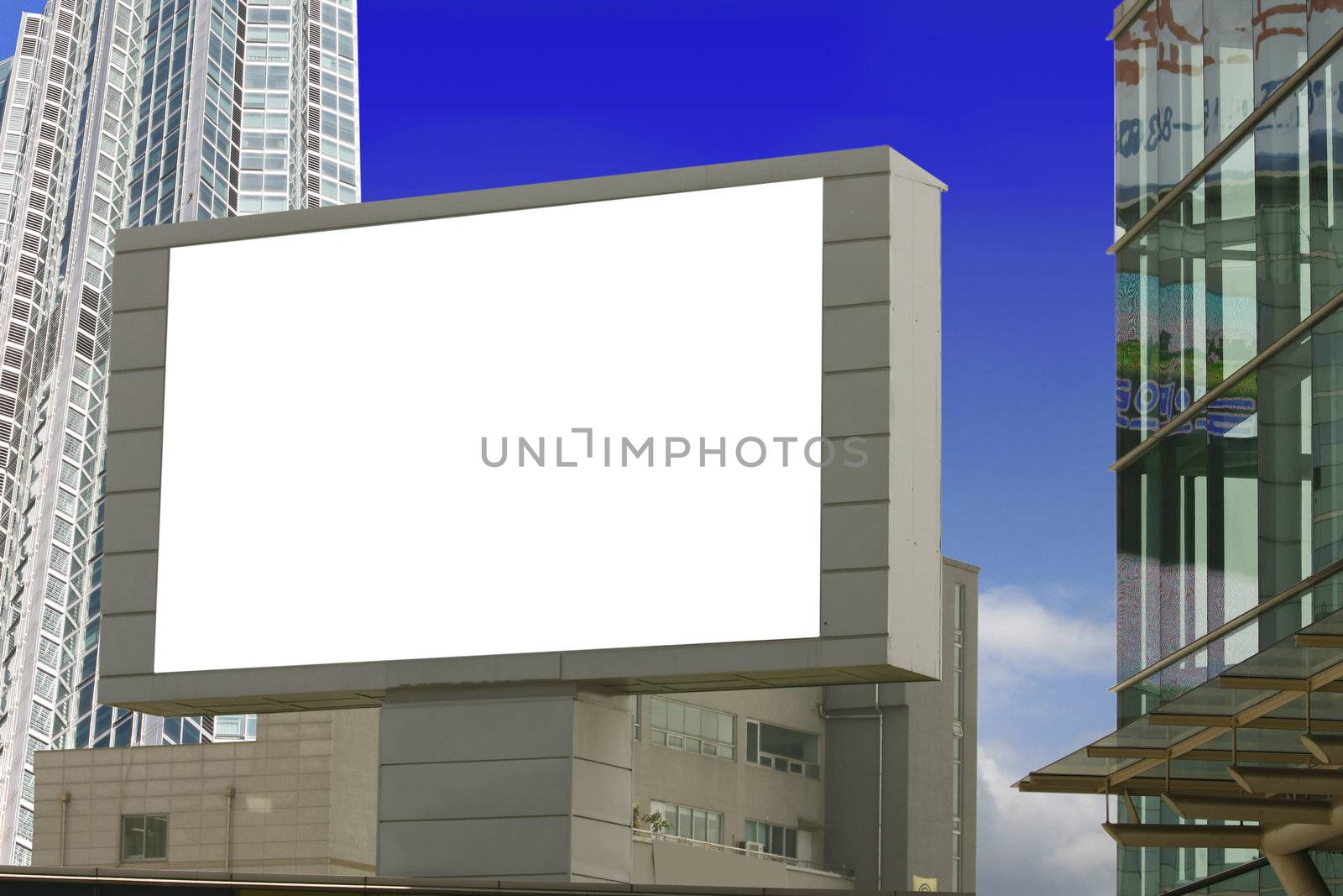 Put your text ads on the white billboard - with buildings as background.