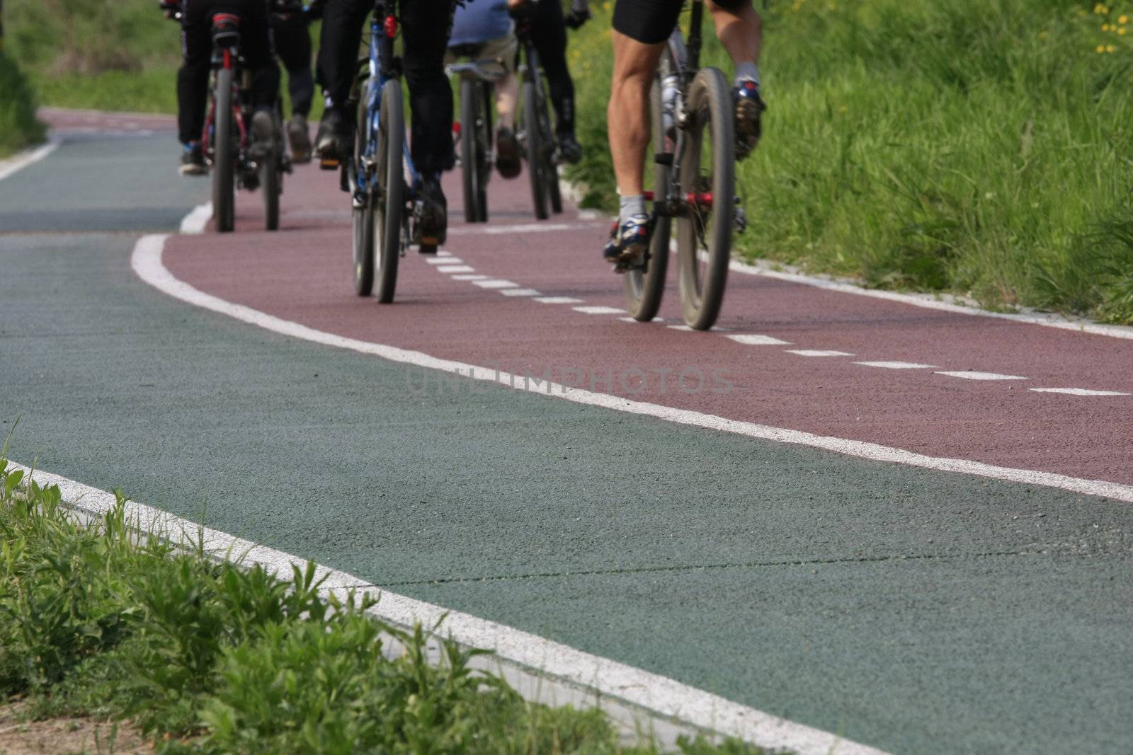 Bicycle recreation exercise with bike lane in a countryside setting.