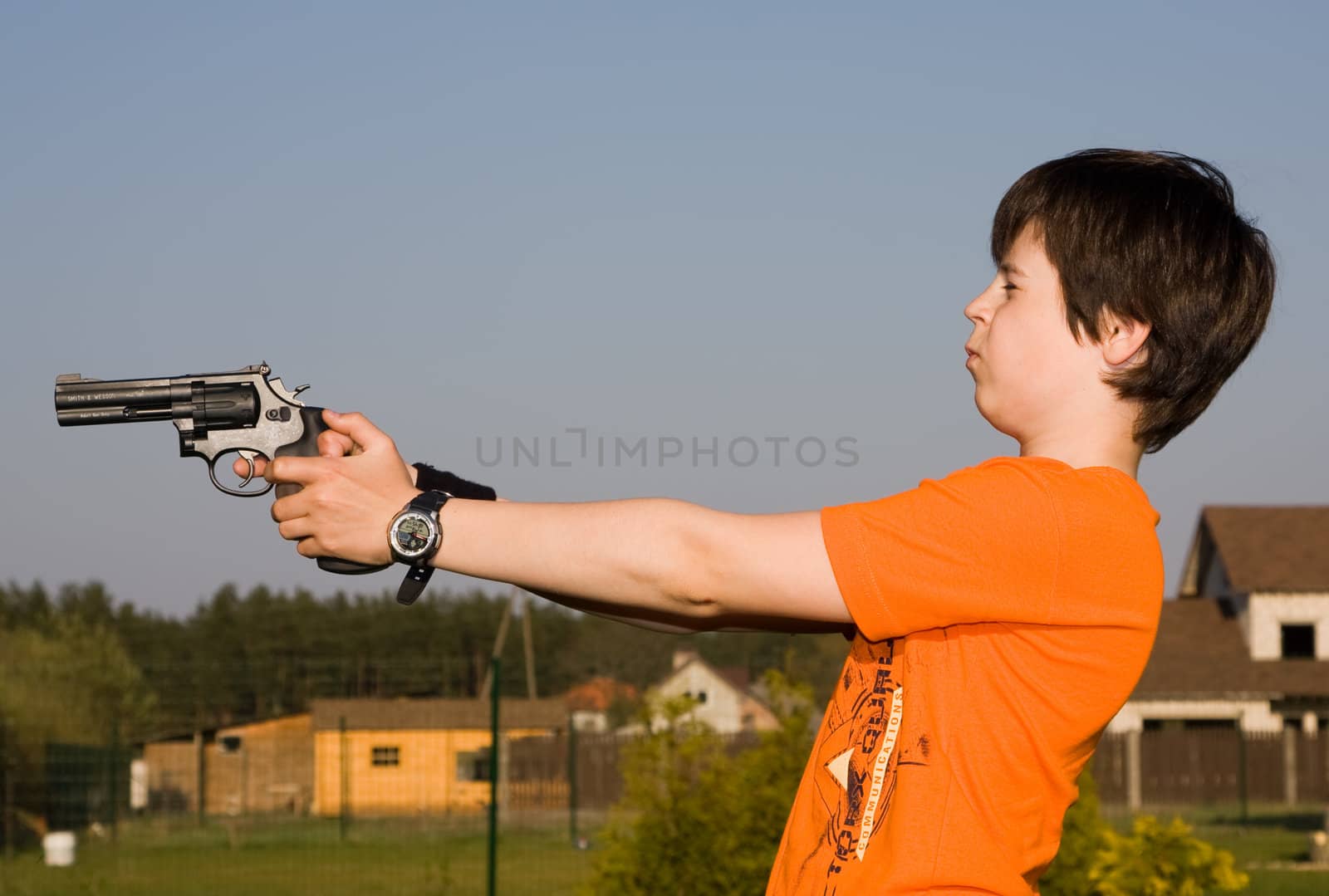 Boy with gun