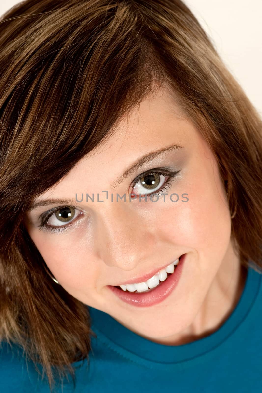 Fashion portrait of smiling beautiful teenager girl