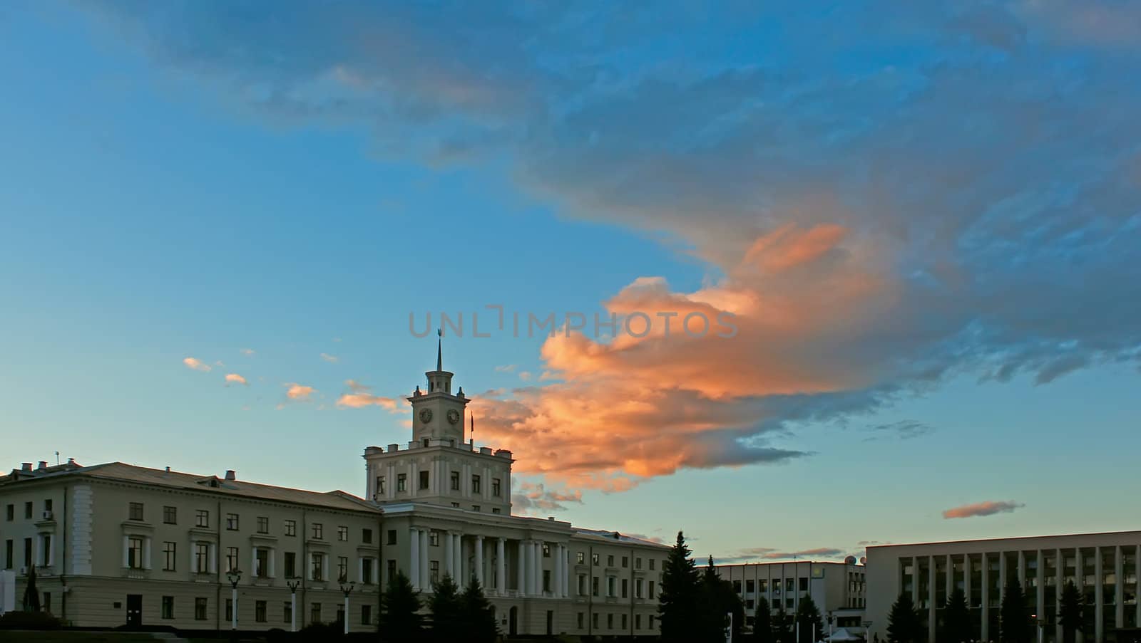 Cloudscape over the administrative building at the sunset. City Khmelnitsky, Ukraine