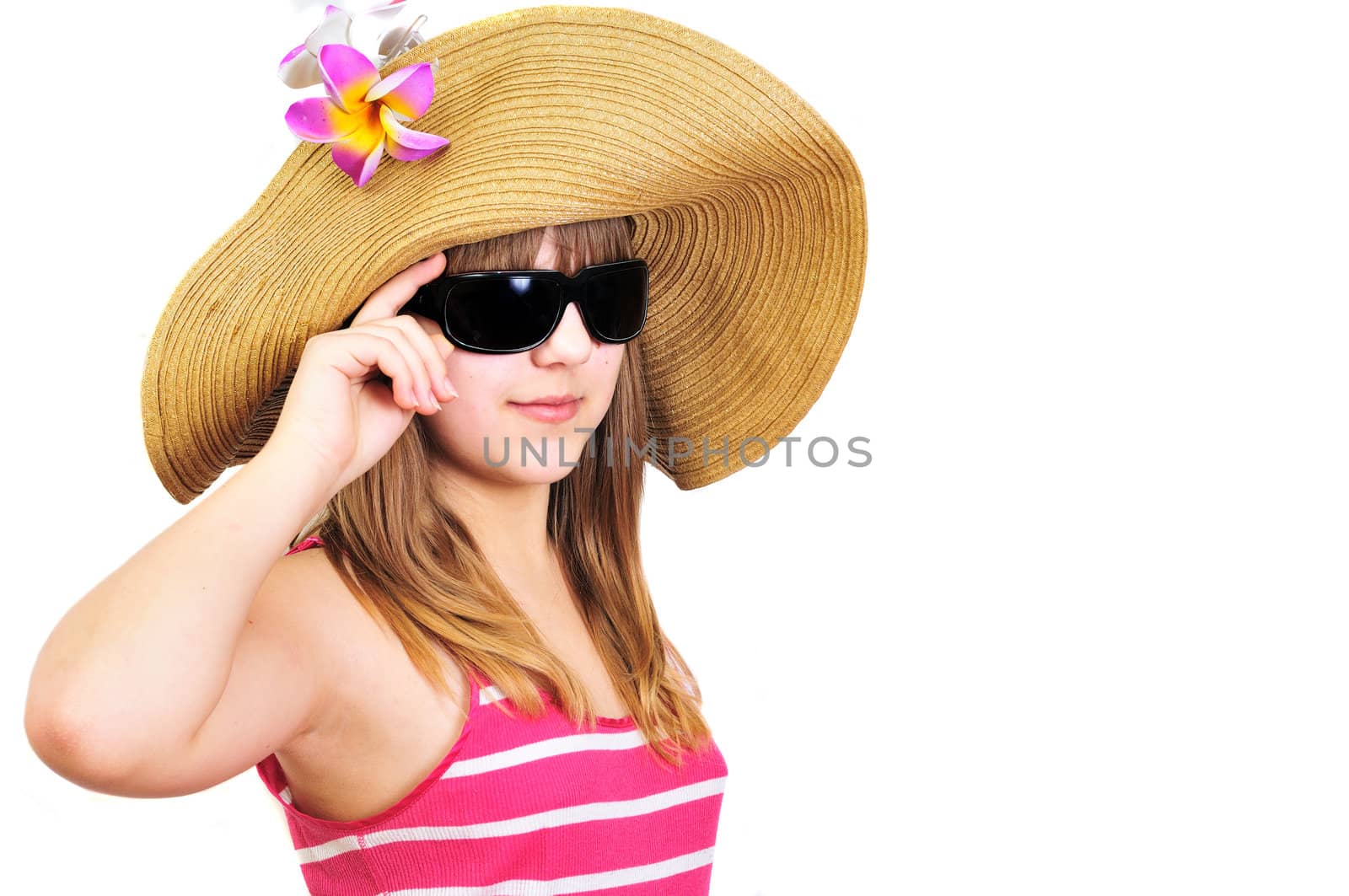 teen girl wearing straw hat and  sunglasses