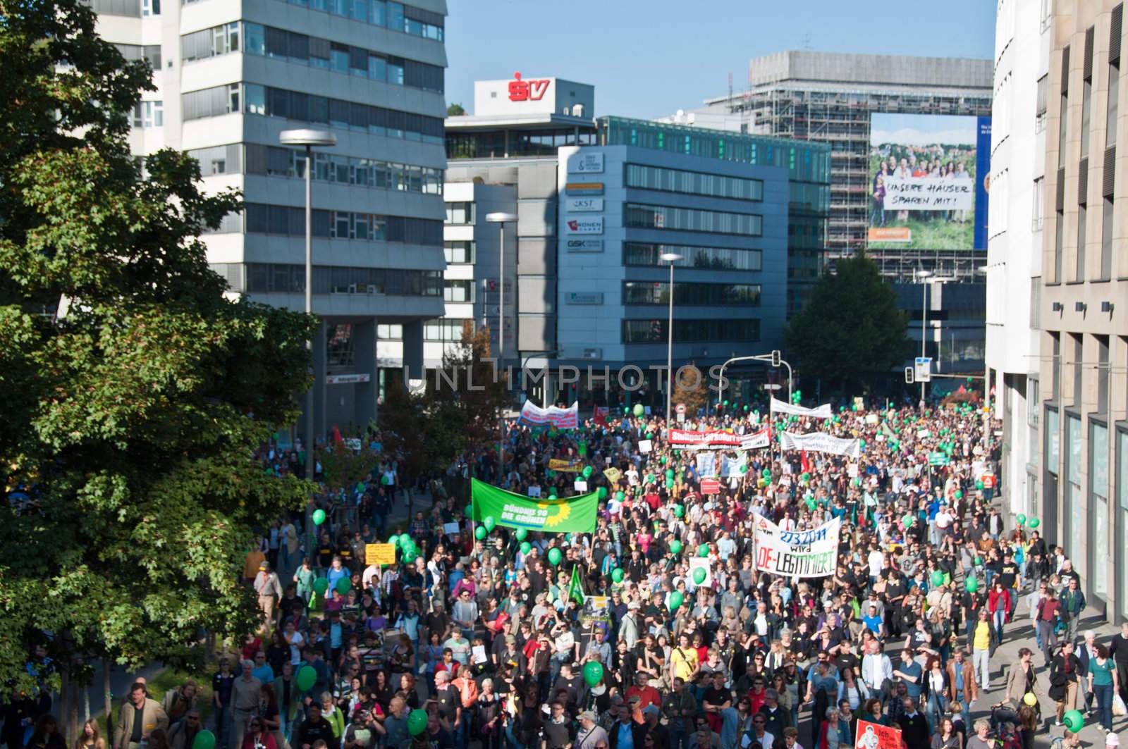 STUTTGART - Oct 09: 150K people protest against the S21 rail project in Stuttgart on Oct 09, 2010 in Stuttgart. S21 station is one of the most expensive and controversial railway projects with regular demonstrations going on. The photo shows the main demonstration with at least 150.000 people participating on a march through the main streets of Stuttgart, ending in a huge event in the Schlosspark.