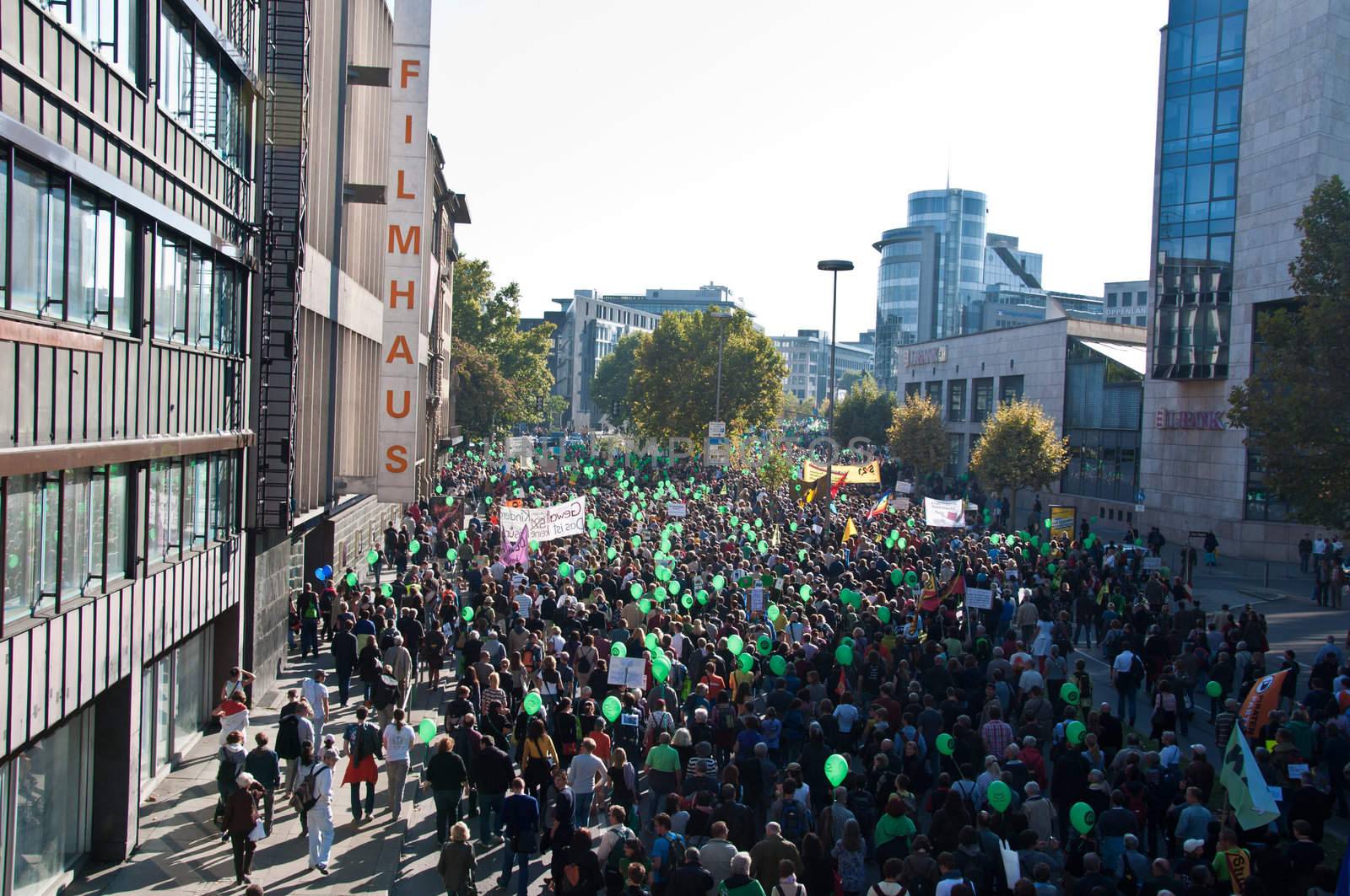 STUTTGART - Oct 09: 150K people protest against the S21 rail project in Stuttgart on Oct 09, 2010 in Stuttgart. S21 station is one of the most expensive and controversial railway projects with regular demonstrations going on. The photo shows the main demonstration with at least 150.000 people participating on a march through the main streets of Stuttgart, ending in a huge event in the Schlosspark.