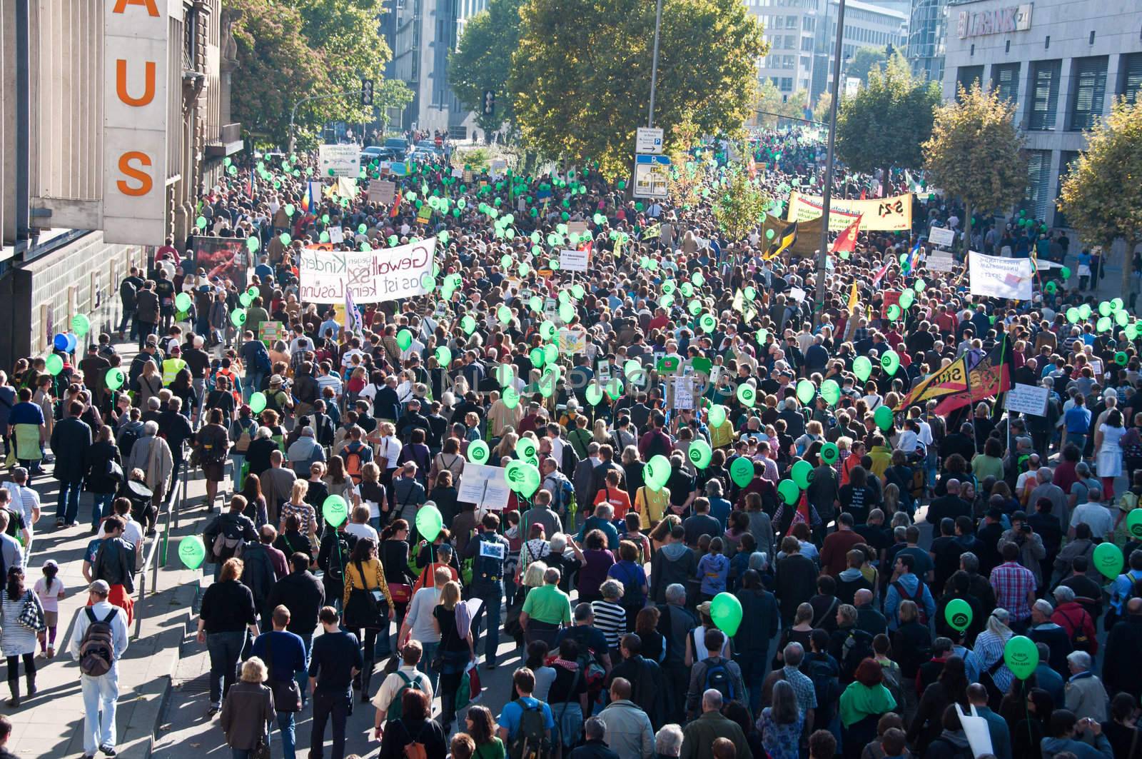 STUTTGART - Oct 09: 150K people protest against the S21 rail project in Stuttgart on Oct 09, 2010 in Stuttgart. S21 station is one of the most expensive and controversial railway projects with regular demonstrations going on. The photo shows the main demonstration with at least 150.000 people participating on a march through the main streets of Stuttgart, ending in a huge event in the Schlosspark.