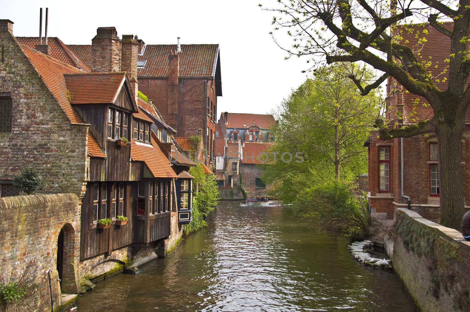 Classic view of channels of Bruges. Belgium. Medieval fairytale city. Summer urban landscape. 