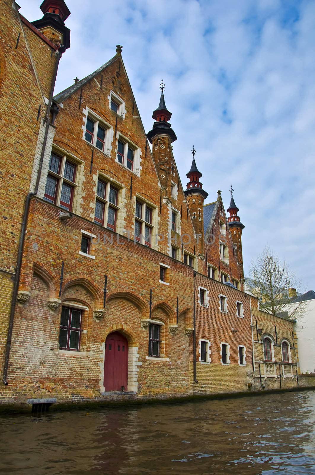 Classic view of channels of Bruges. Belgium. Medieval fairytale city. Summer urban landscape. 