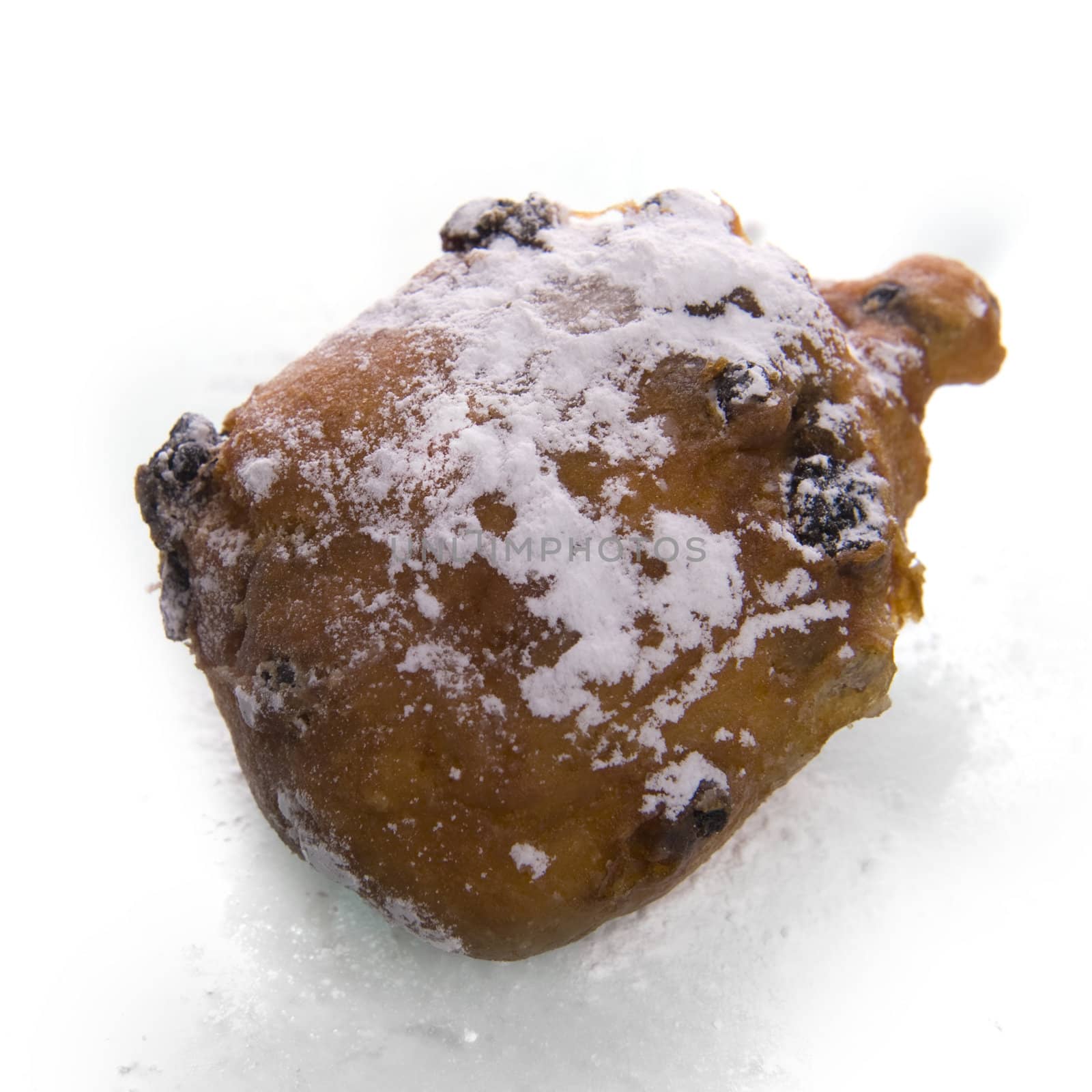 a oliebol on white, a dutch tradition