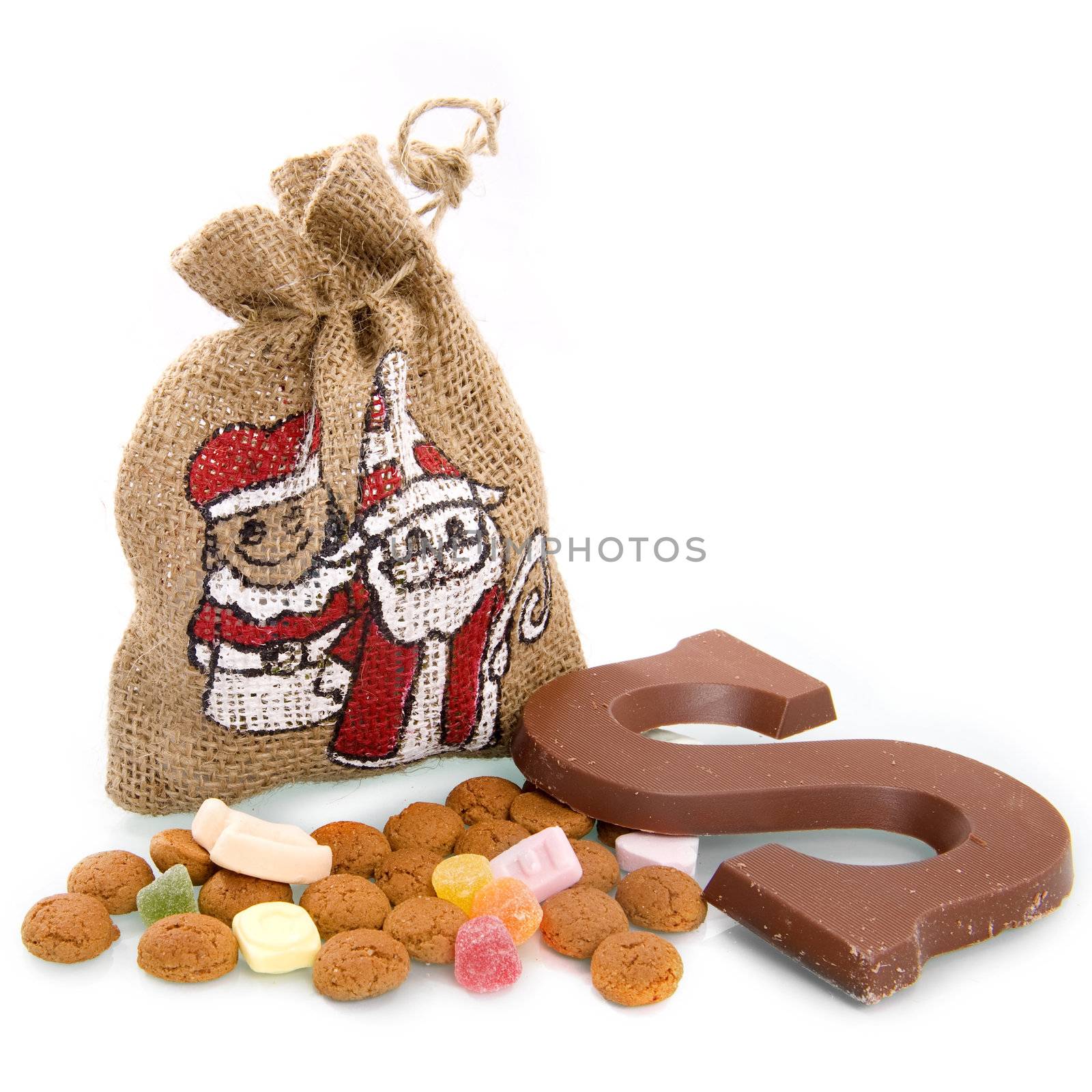 a bag, nuts and a chocolate letter for "sinterklaas", a dutch tradition