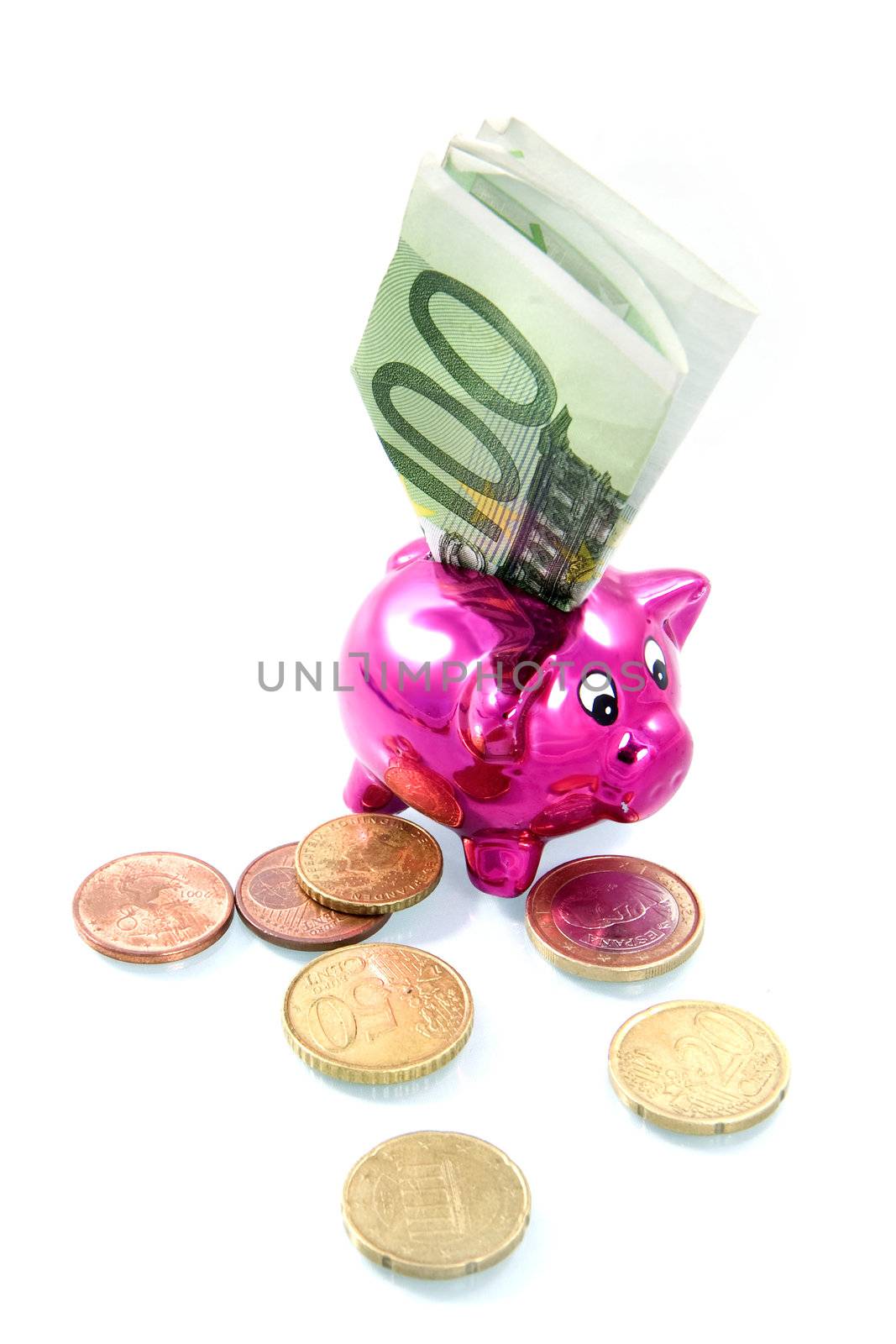 hundred euro in a piggy bank on a white background