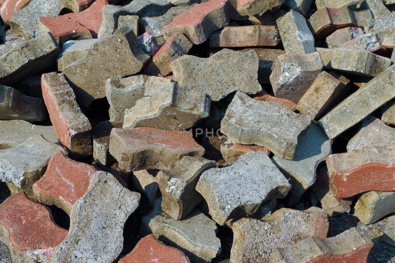 factory demolition stone stack of rubble on concrete floor