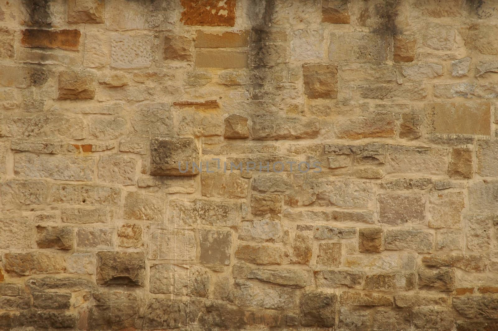 odl brick wall made of stone blocks, belongs to barracks in sydney