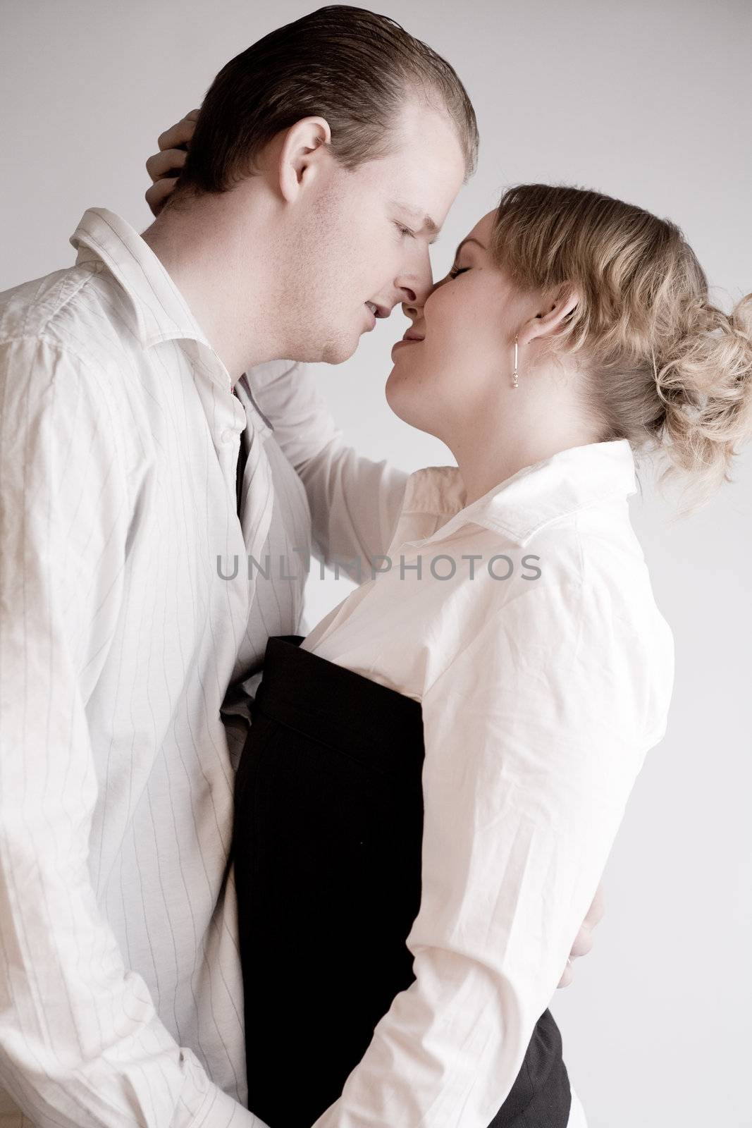 Studio portrait of a young amorous couple