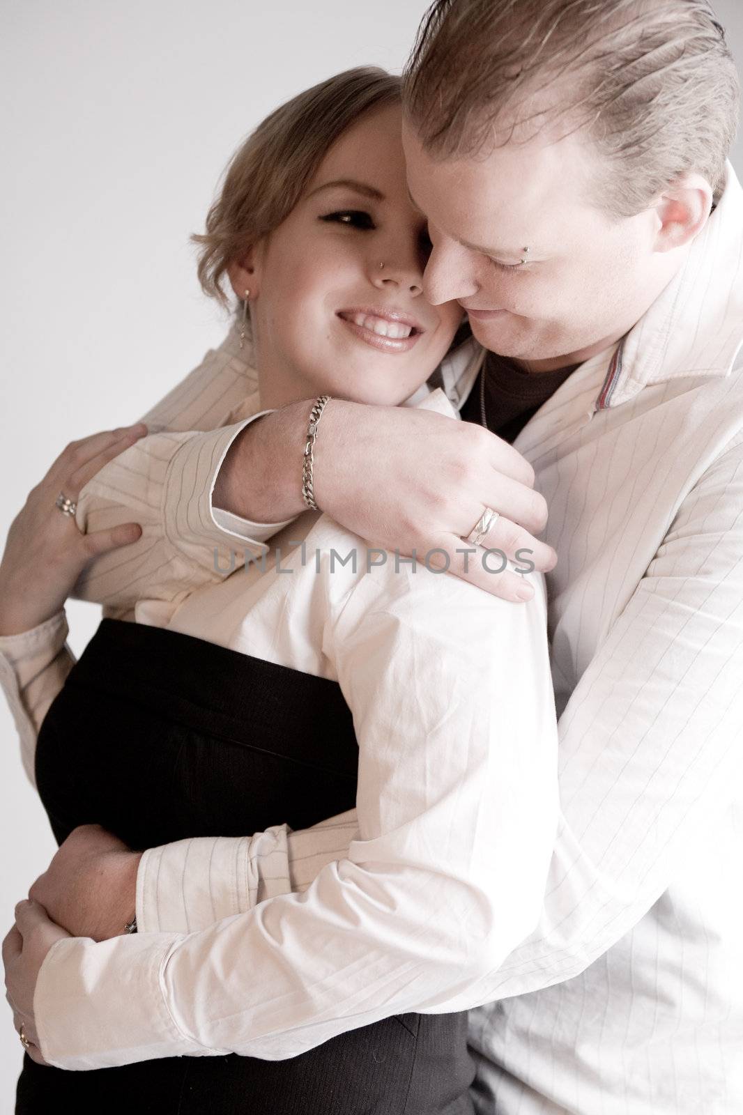 Portrait of a young loving holding couple by DNFStyle