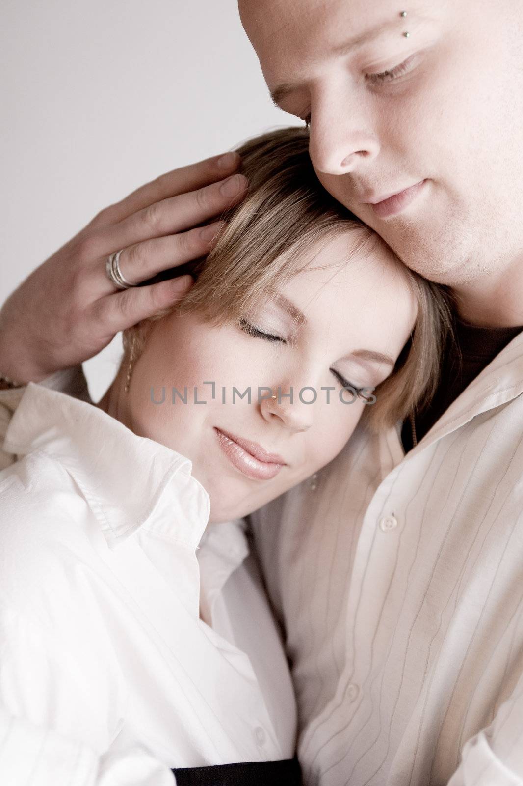 Portrait of a relaxed young loving couple by DNFStyle